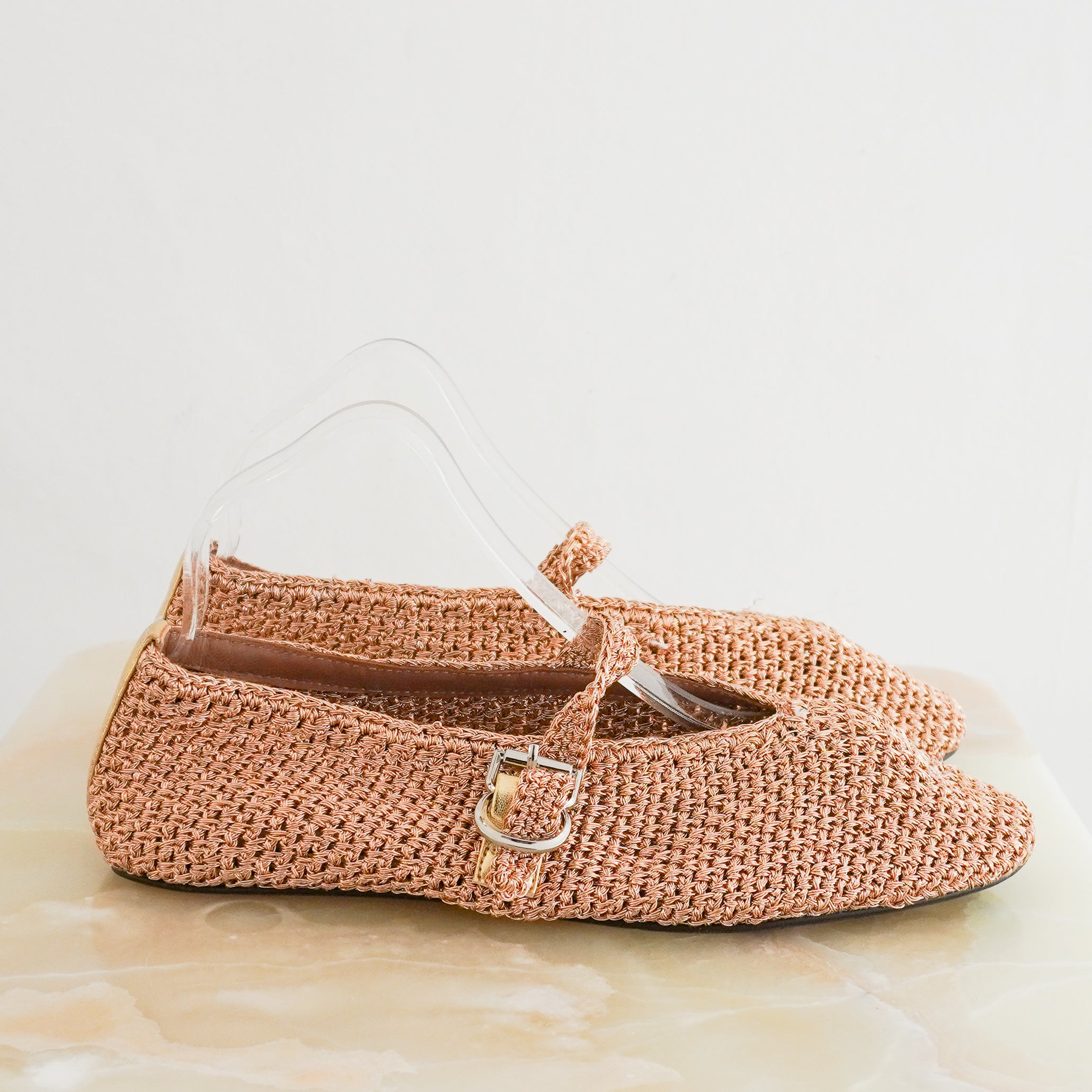 Alaïa Rose Gold Woven Raffia Flats side photo chelsea london