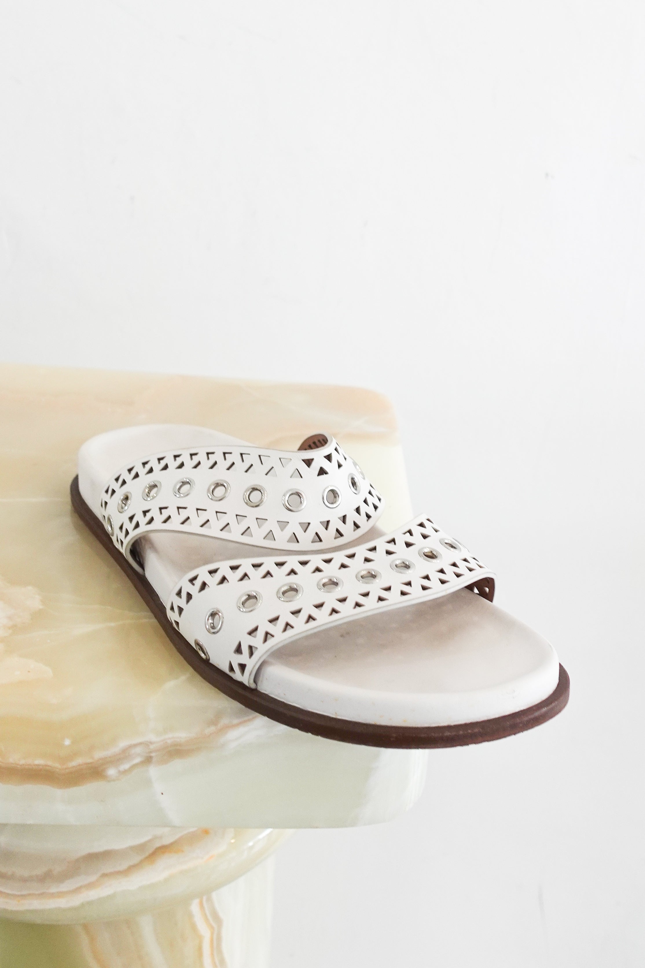 Alaia Perforated Sliders in white RRP £750 | Authentic Preloved