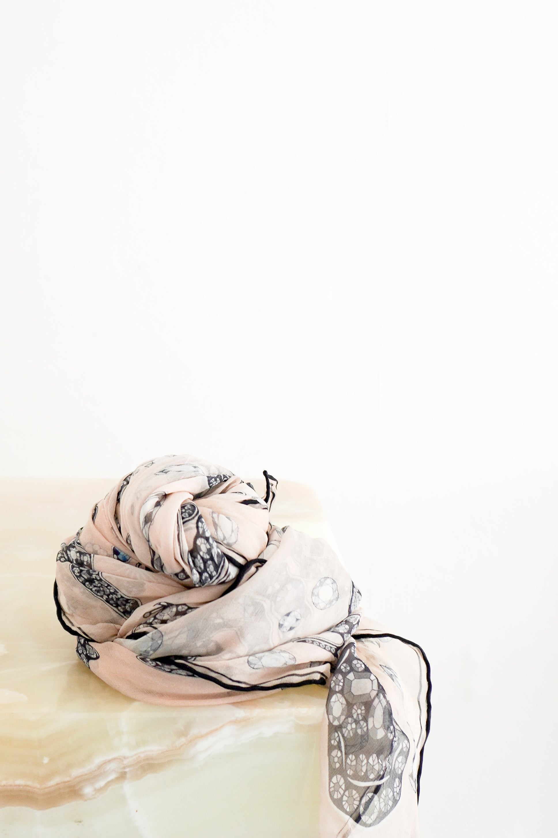 front photo of a Alexander McQueen Pink Embellished Skull Scarf 
