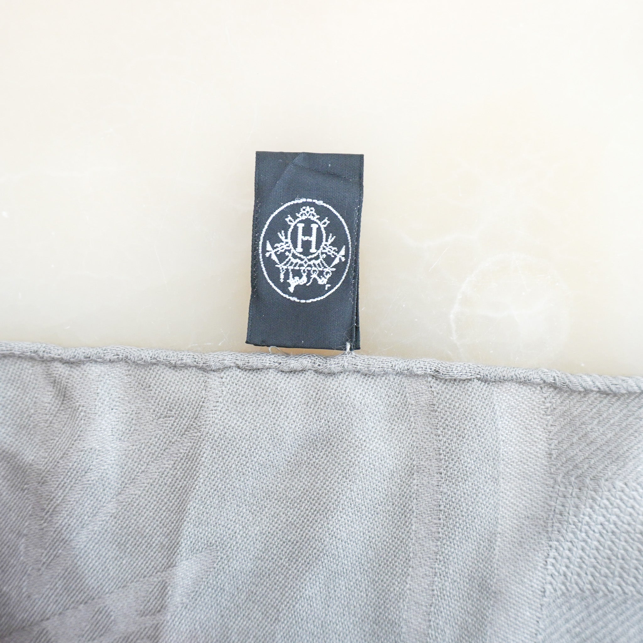 BAck image of the Hermès Grey Silk and Cashmere H Jacquard Shawl 