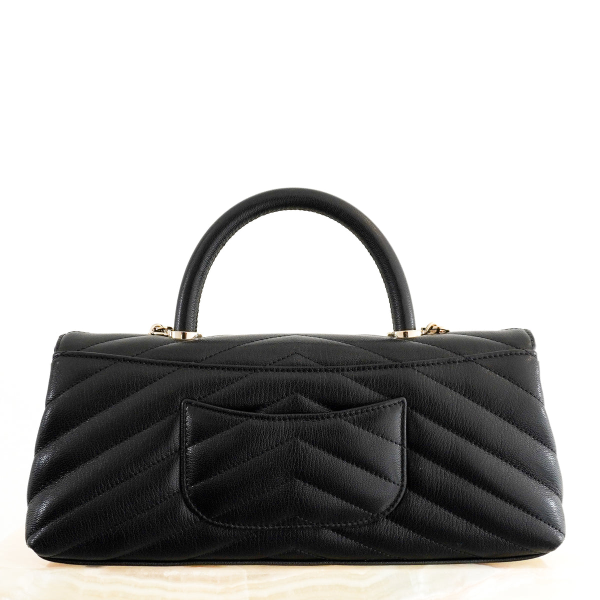 Back: Chanel Coco Top Handle Black Chevron Quilted Leather Bag