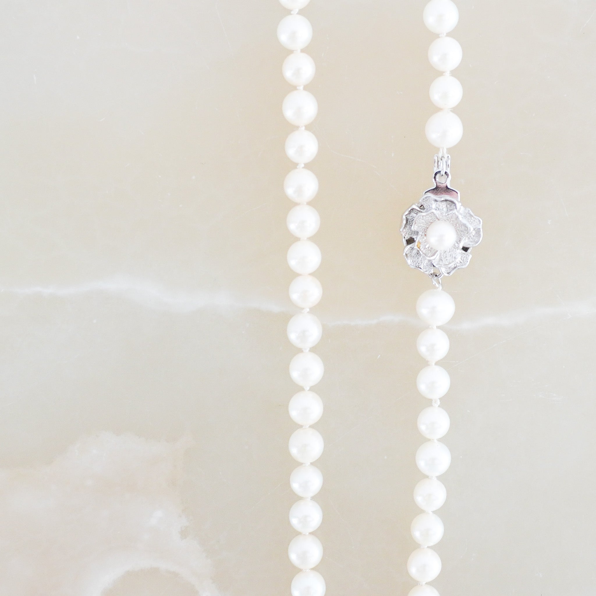 Back image Japanese Vintage Pearl Necklace with Silver Floral Clasp
