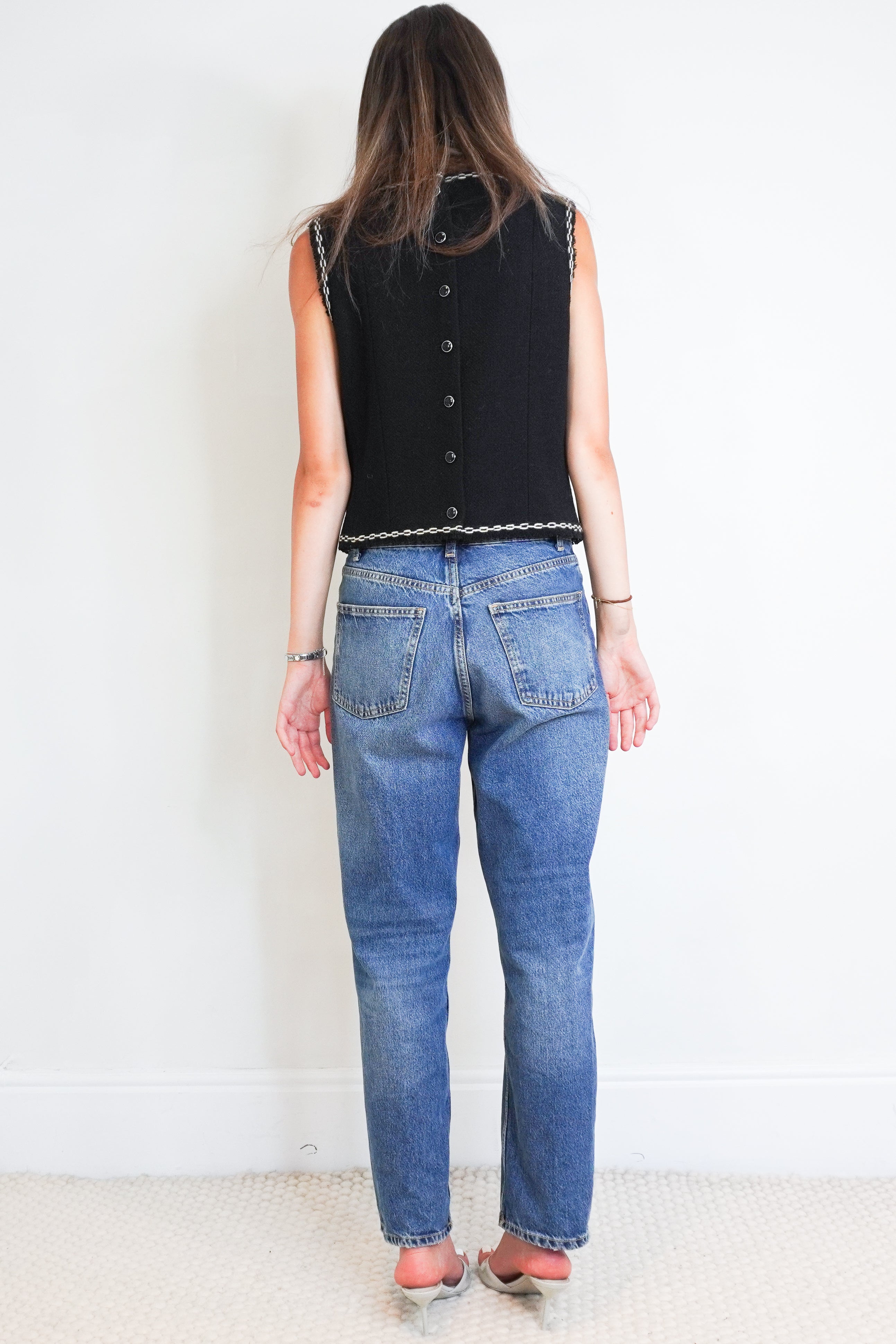 Back image of the Chanel Black Wool Sleeveless Vest with Contrast Chain Trim
