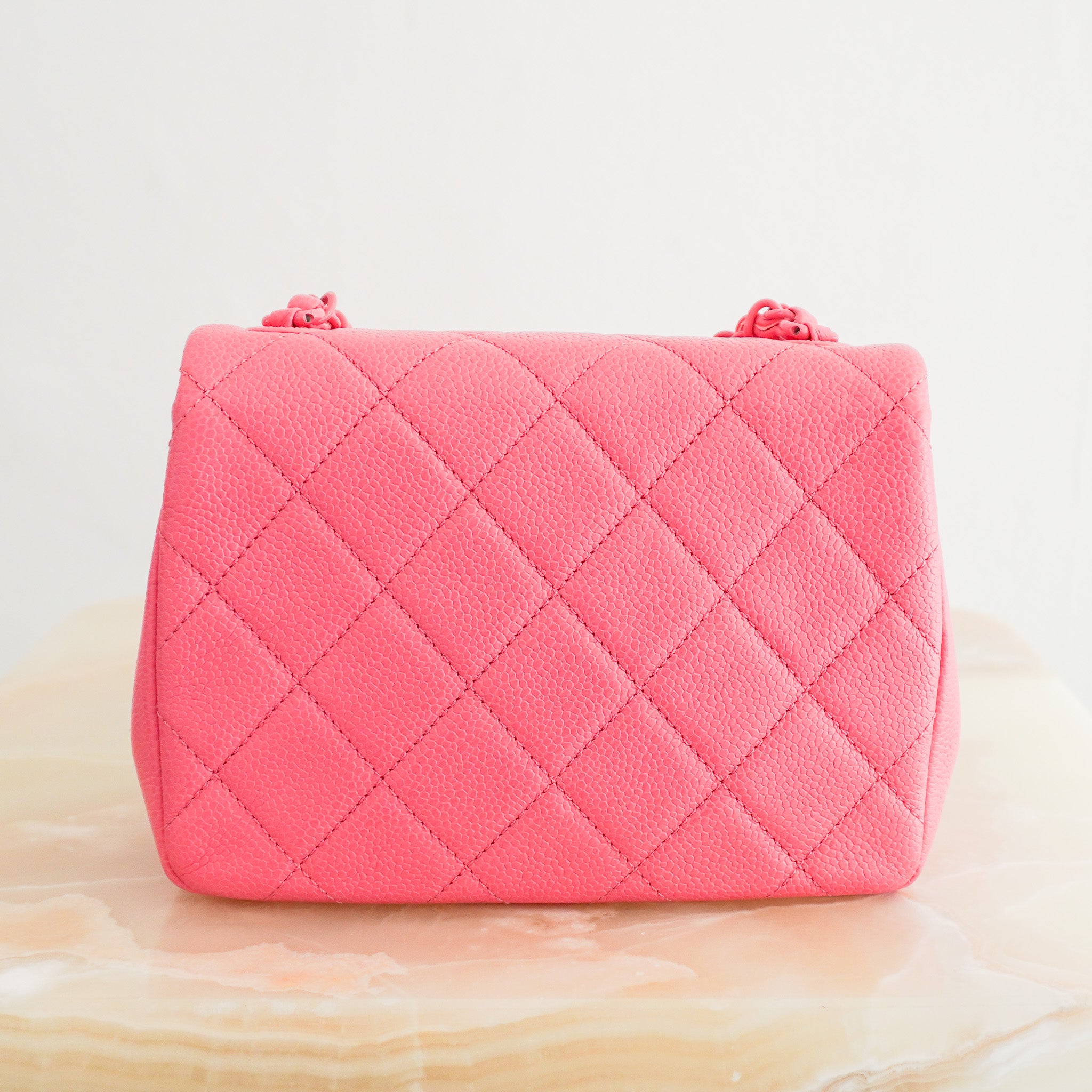 Back image of the Chanel Incognito Mini Square Flap Bag in Monochrome Pink Caviar Leather and Hardware, 2019 
