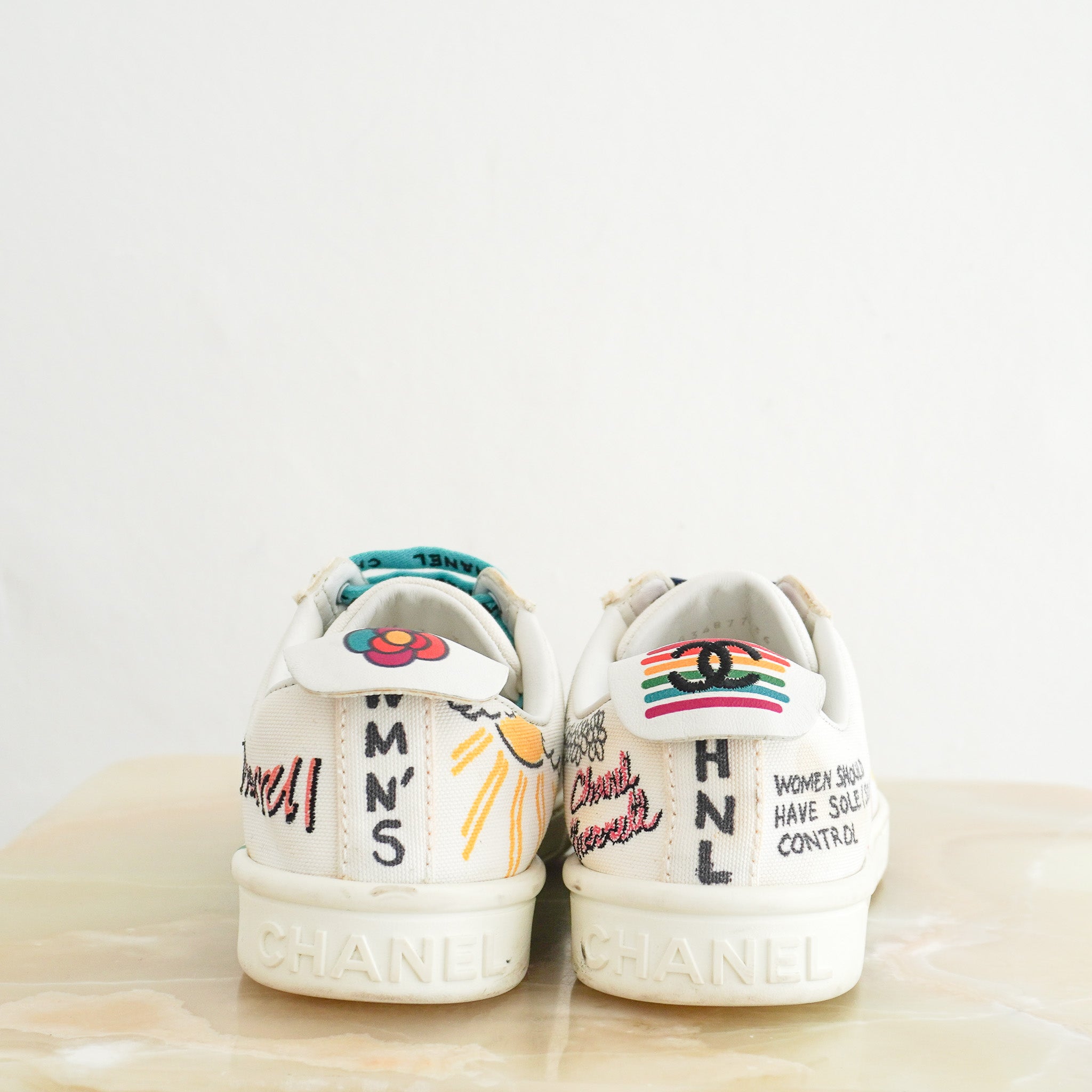 Back image of the Chanel x Pharrell White Multi Colour Sneakers 