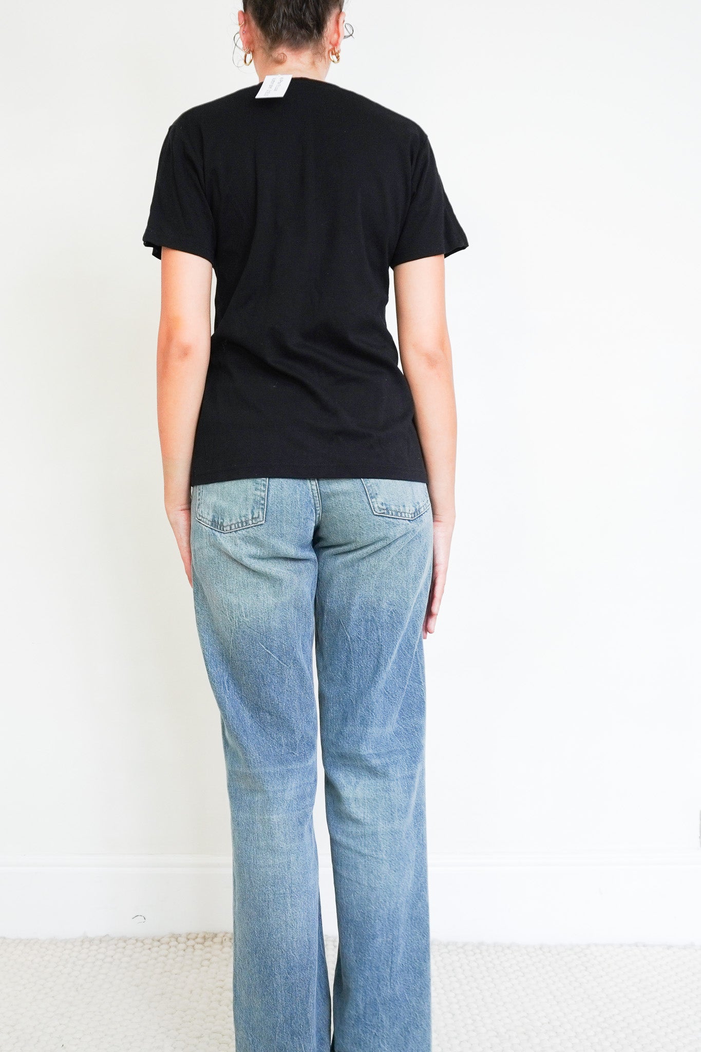 Back image of the Louis Vuitton T-Shirt in Black with chain detail