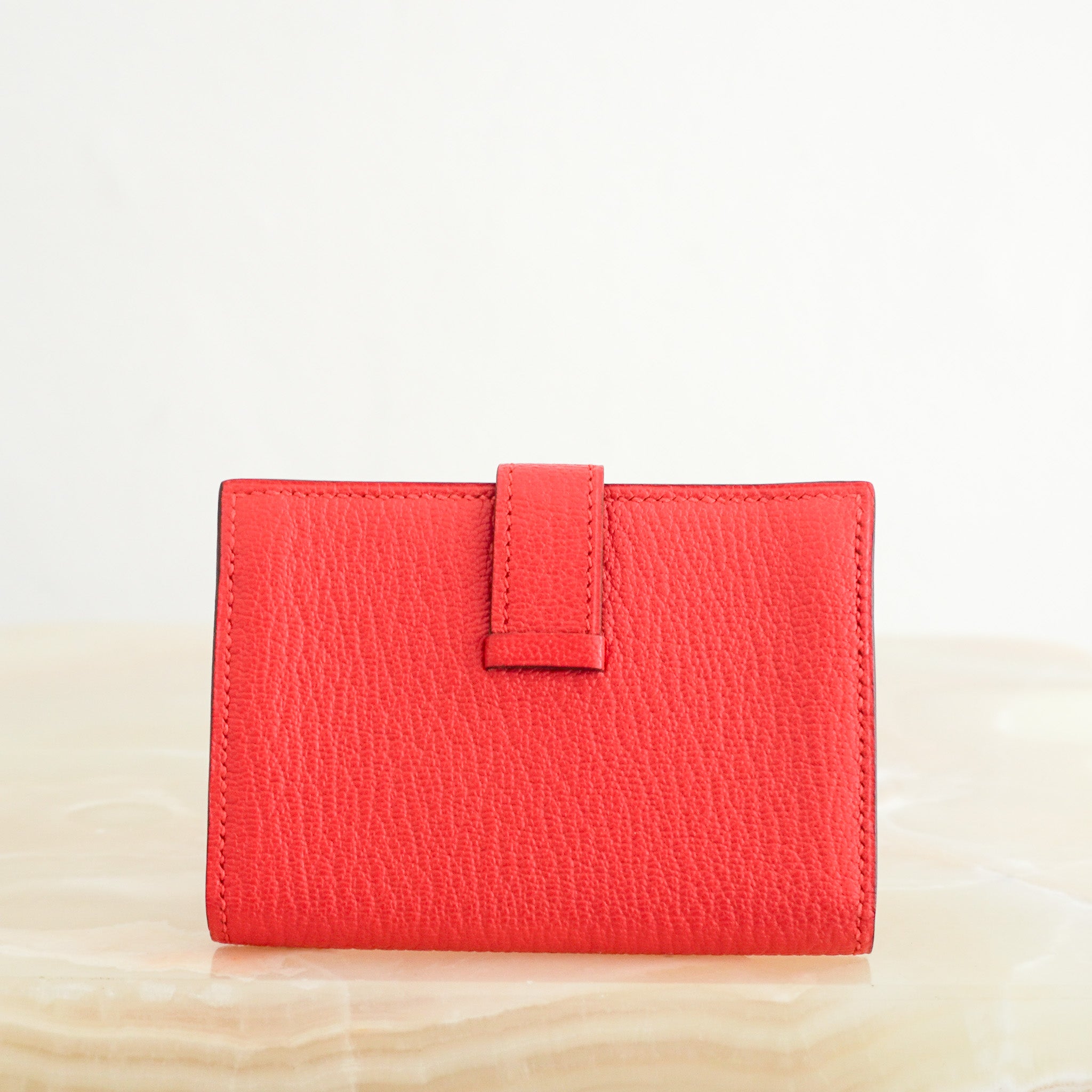Back image of the NEW Hermes Bearn Card Holder in Red
