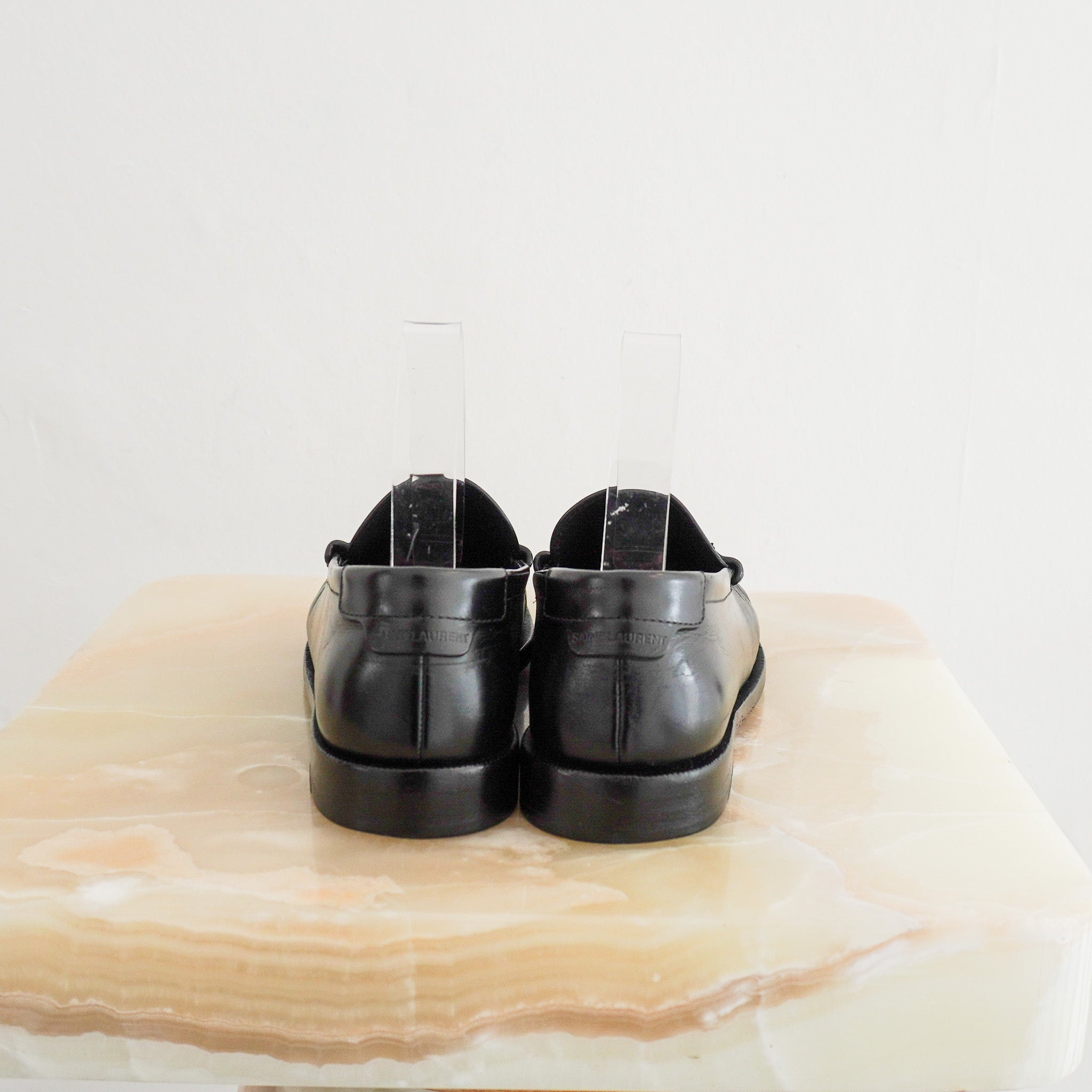 Back image of the Saint Laurent Penny Loafers in Black