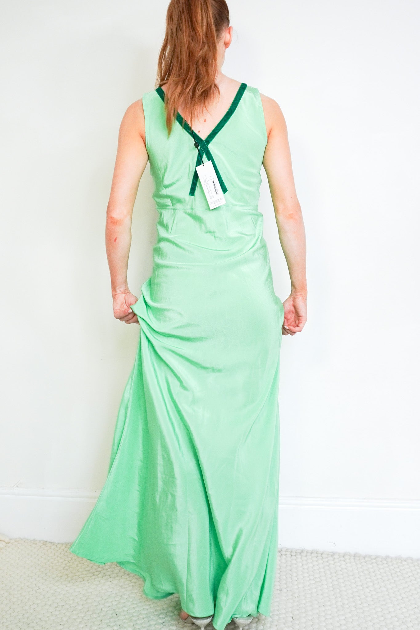 Back image of the Serena Bute V Neck Green Dress 