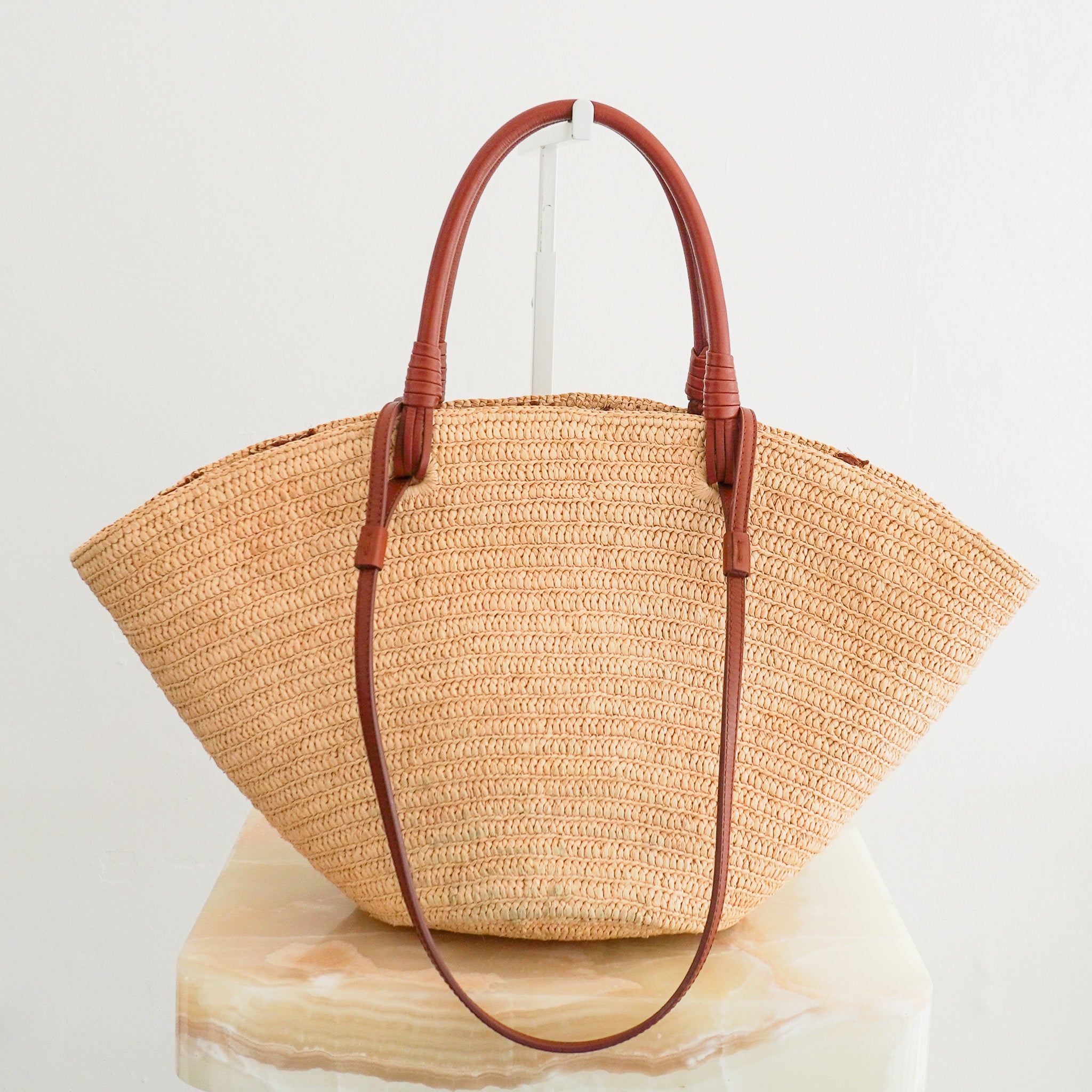 Back image of the Sezane Justie Raffia Bag with Chocolate Embroidered Flowers