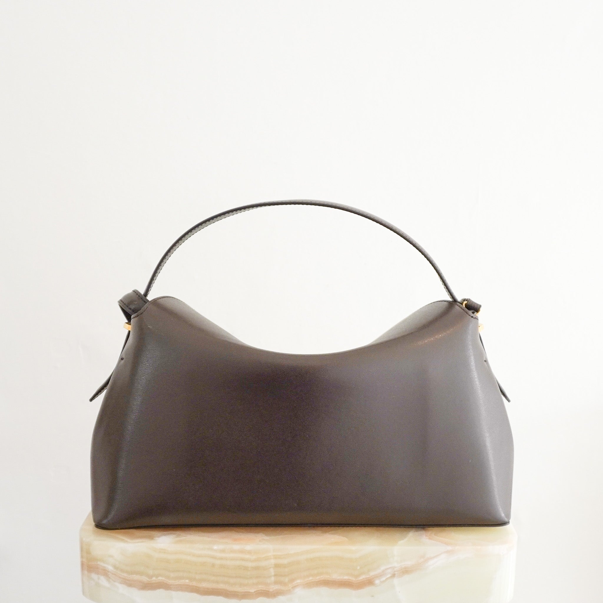 Back image of the Toteme T-Lock Top Handle Bark Bag 