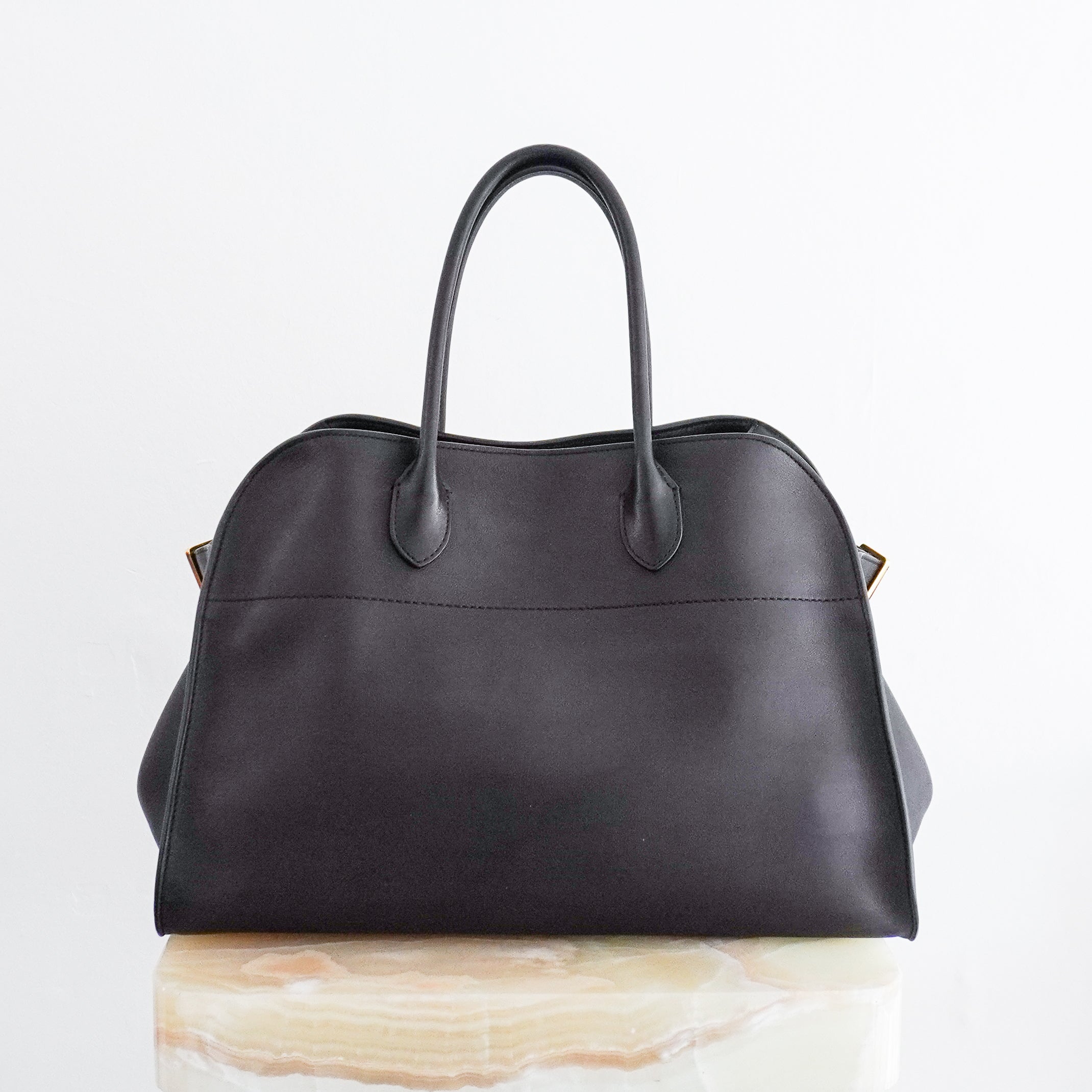 Back photo of The Row Black Margaux Shoulder Bag