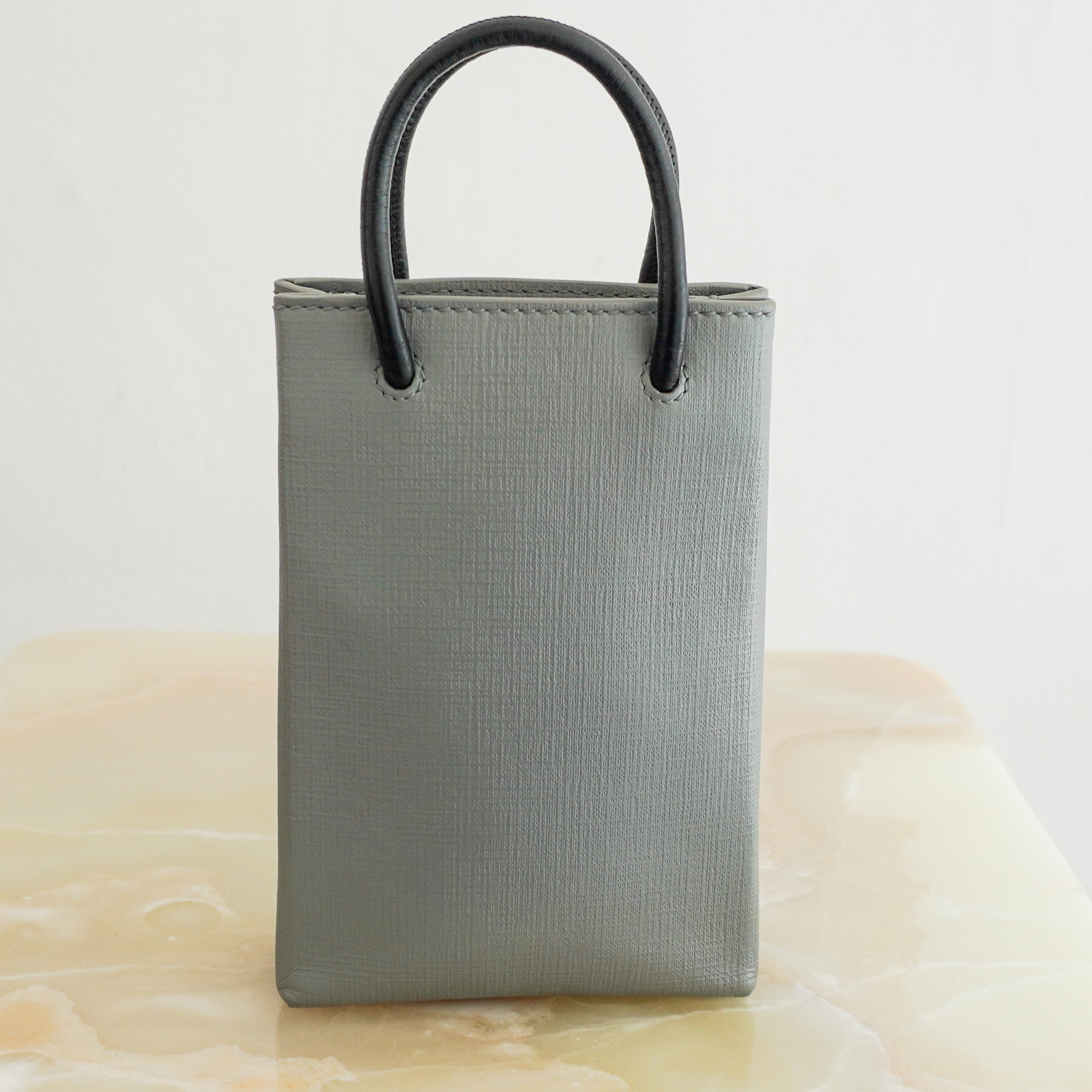 Back photo of the Balenciaga Shopping Phone Holder Bag