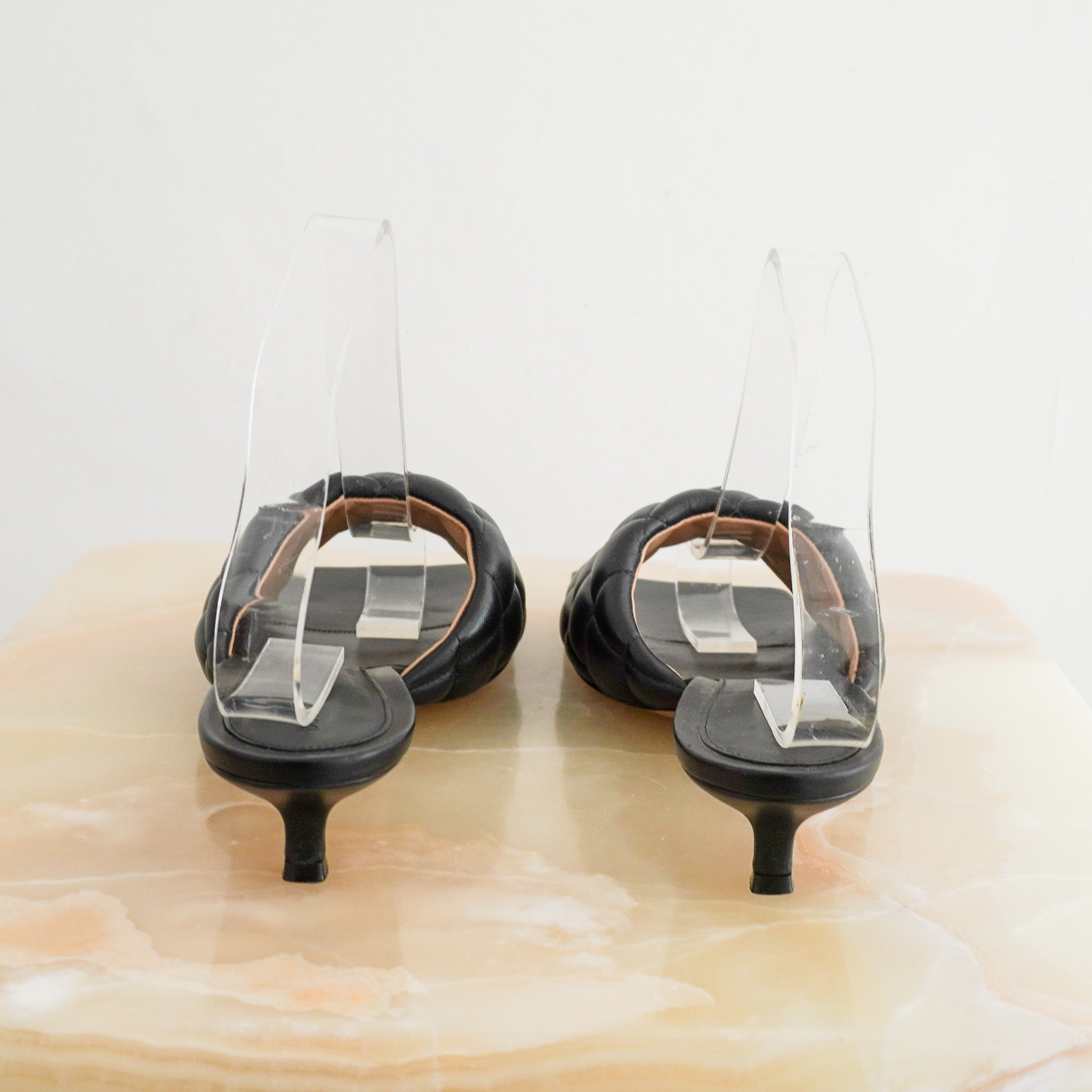 Back photo of the Bottega Veneta Black Mules 