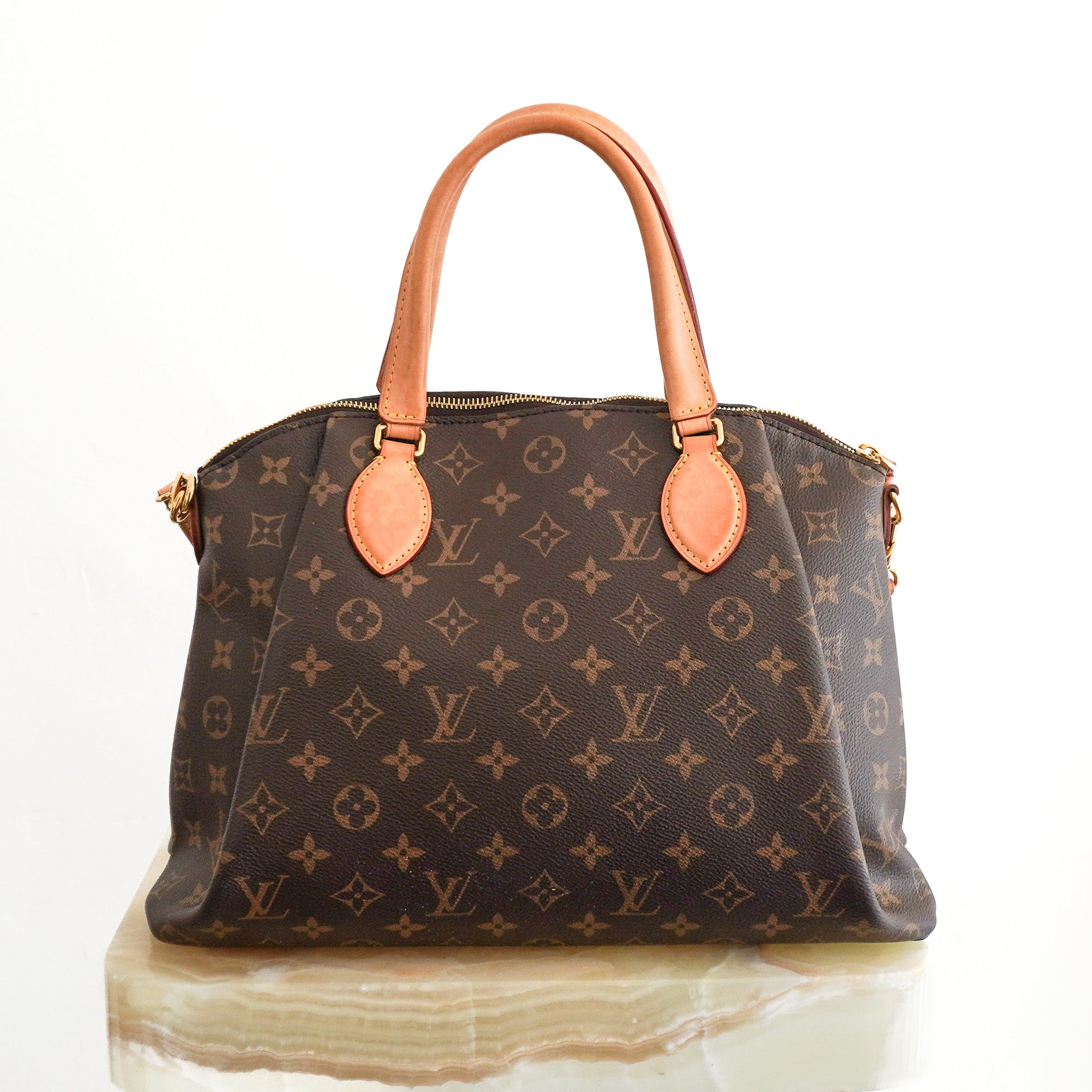 Back photo of the Louis Vuitton Petite Rivoli Moyen Modèle Tote Bag