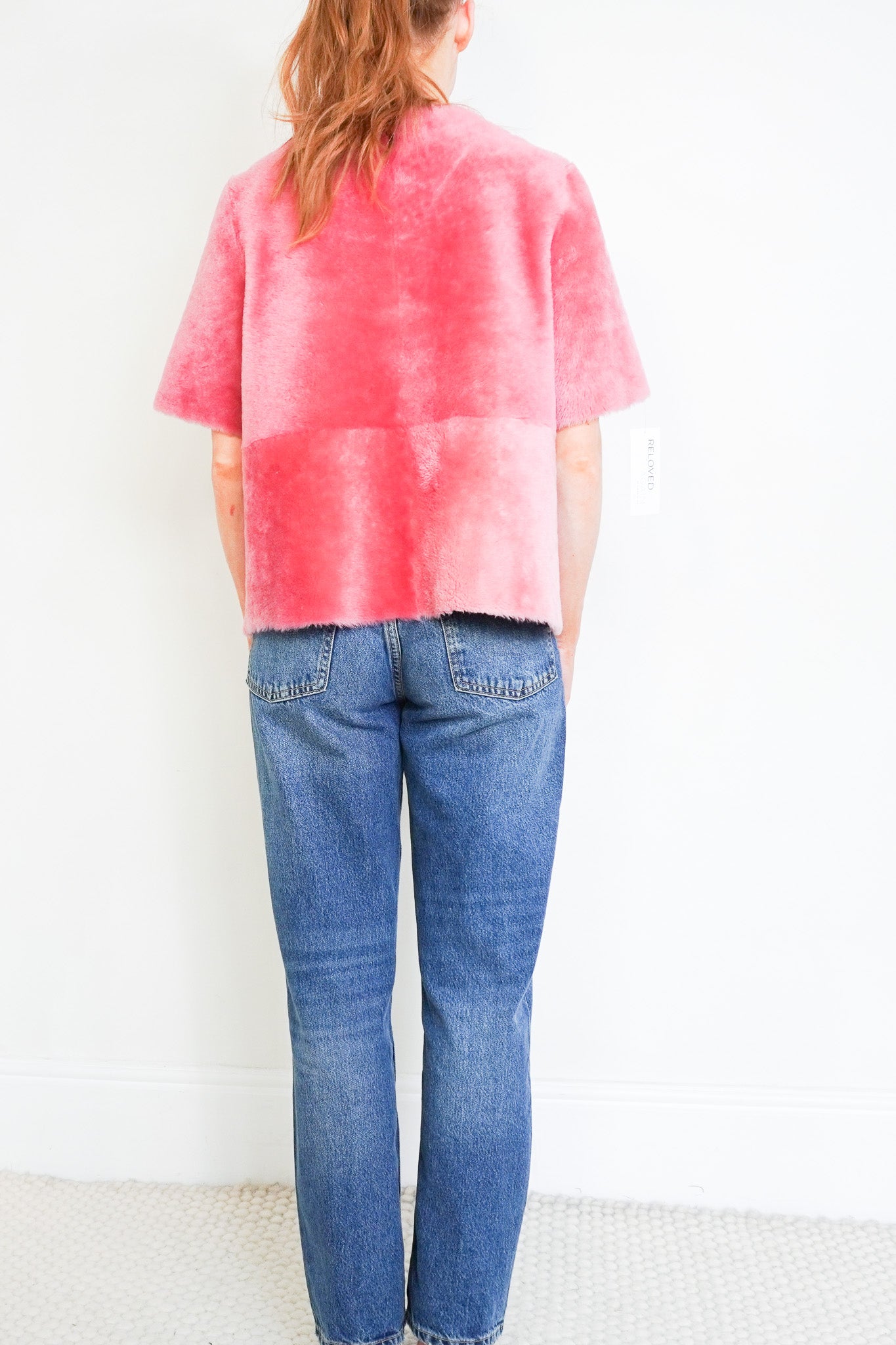 Back photo of the Stone and Waisted Jeanette Pink Shearling Jacket 