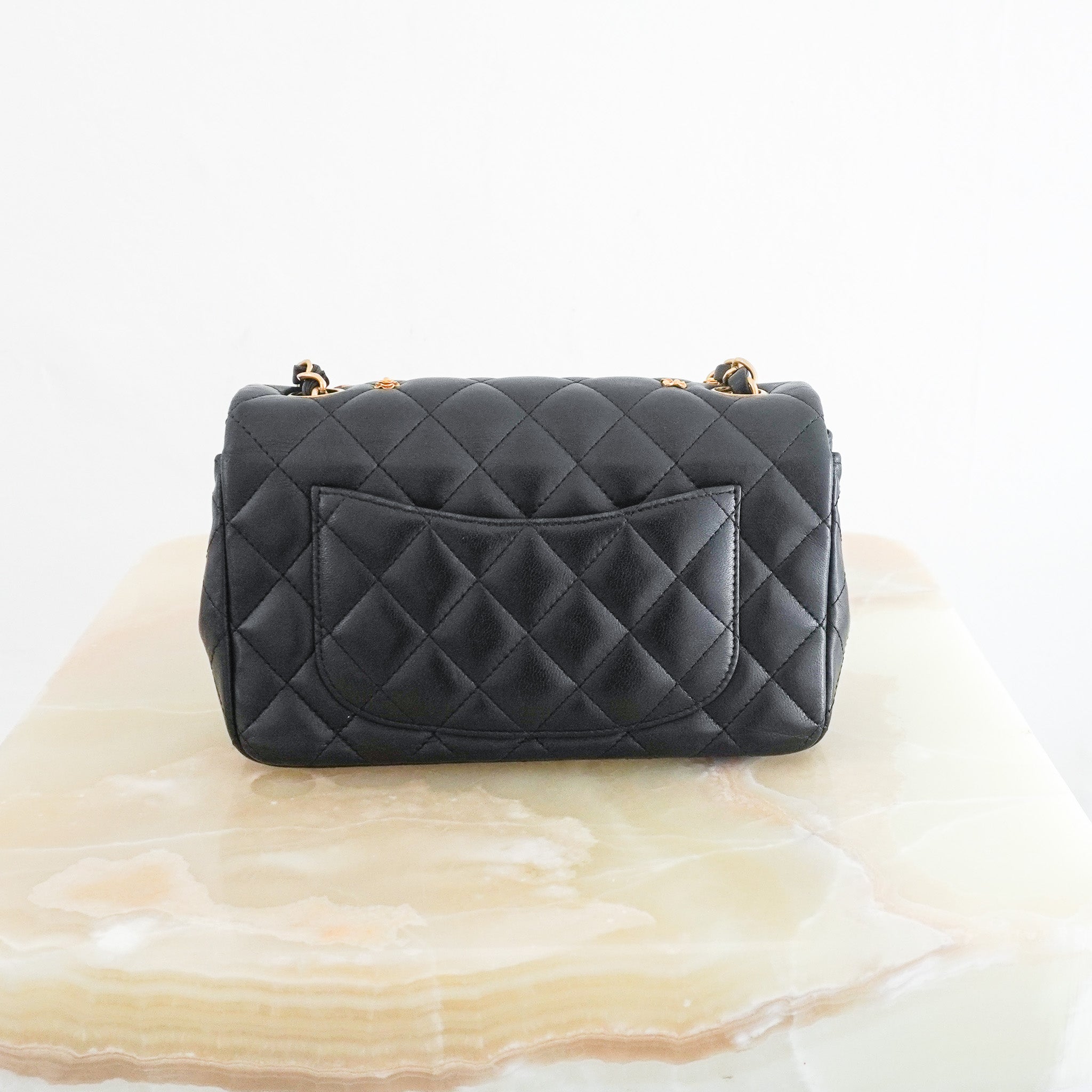 Back photos of the Chanel Mini Lucky Charms Rectangular Flap Bag in Black Lambskin 