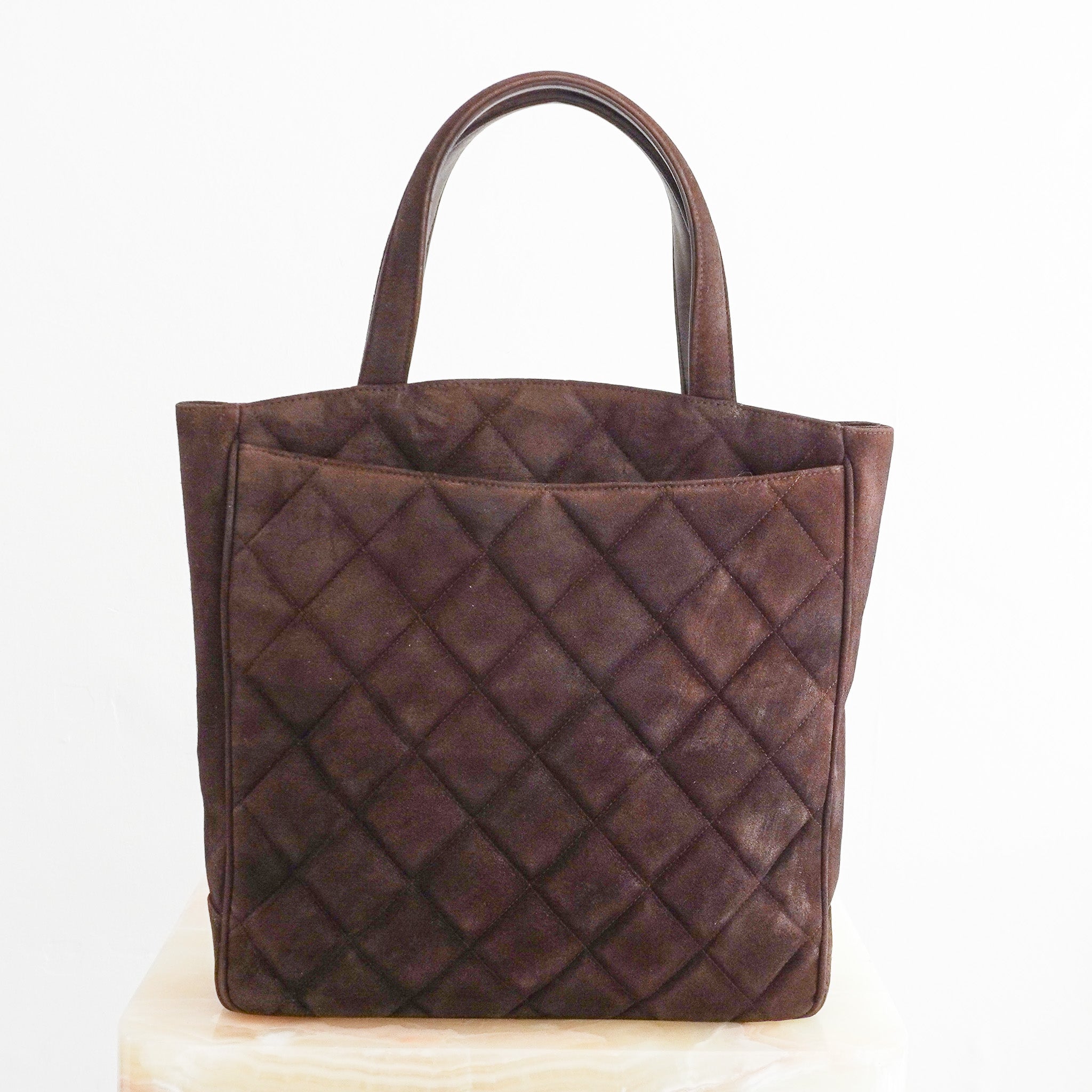 Back photos of the Chanel Vintage Brown Quilted Suede CC Tote Bag 