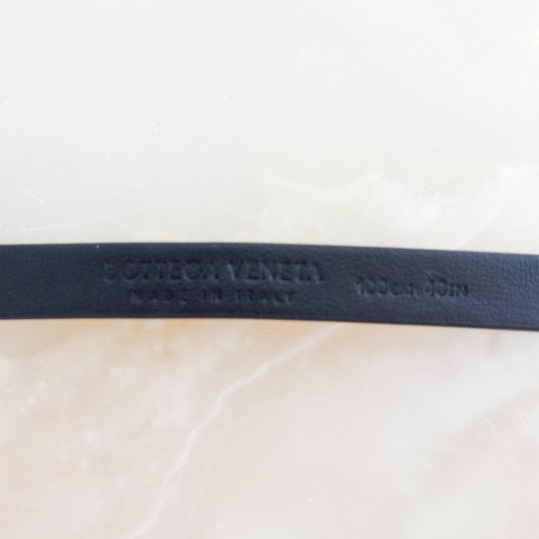 Bottega Veneta Black Slimline belt with gold triangle | Authentic Preloved - Reloved Again