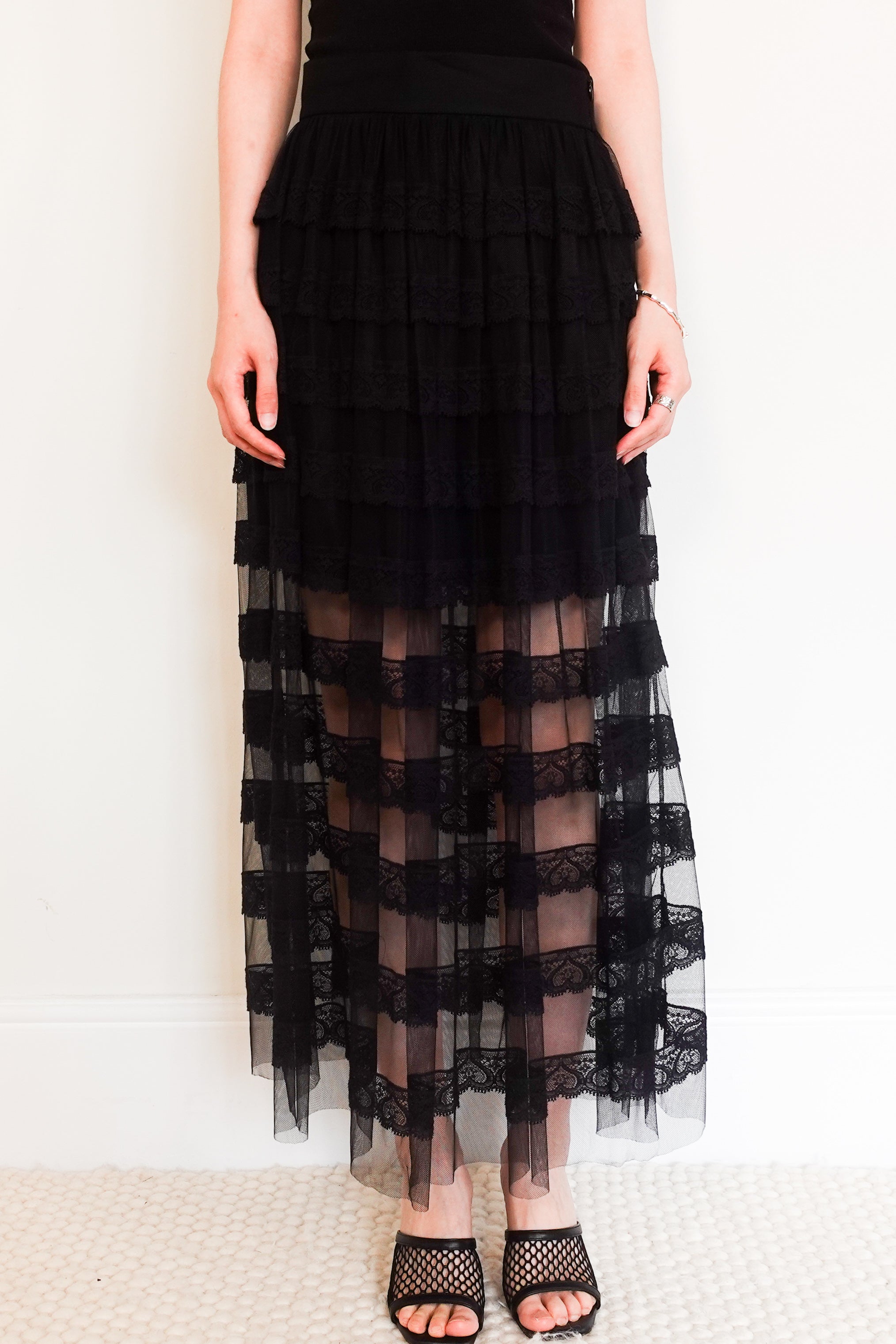 Tiered black lace skirt