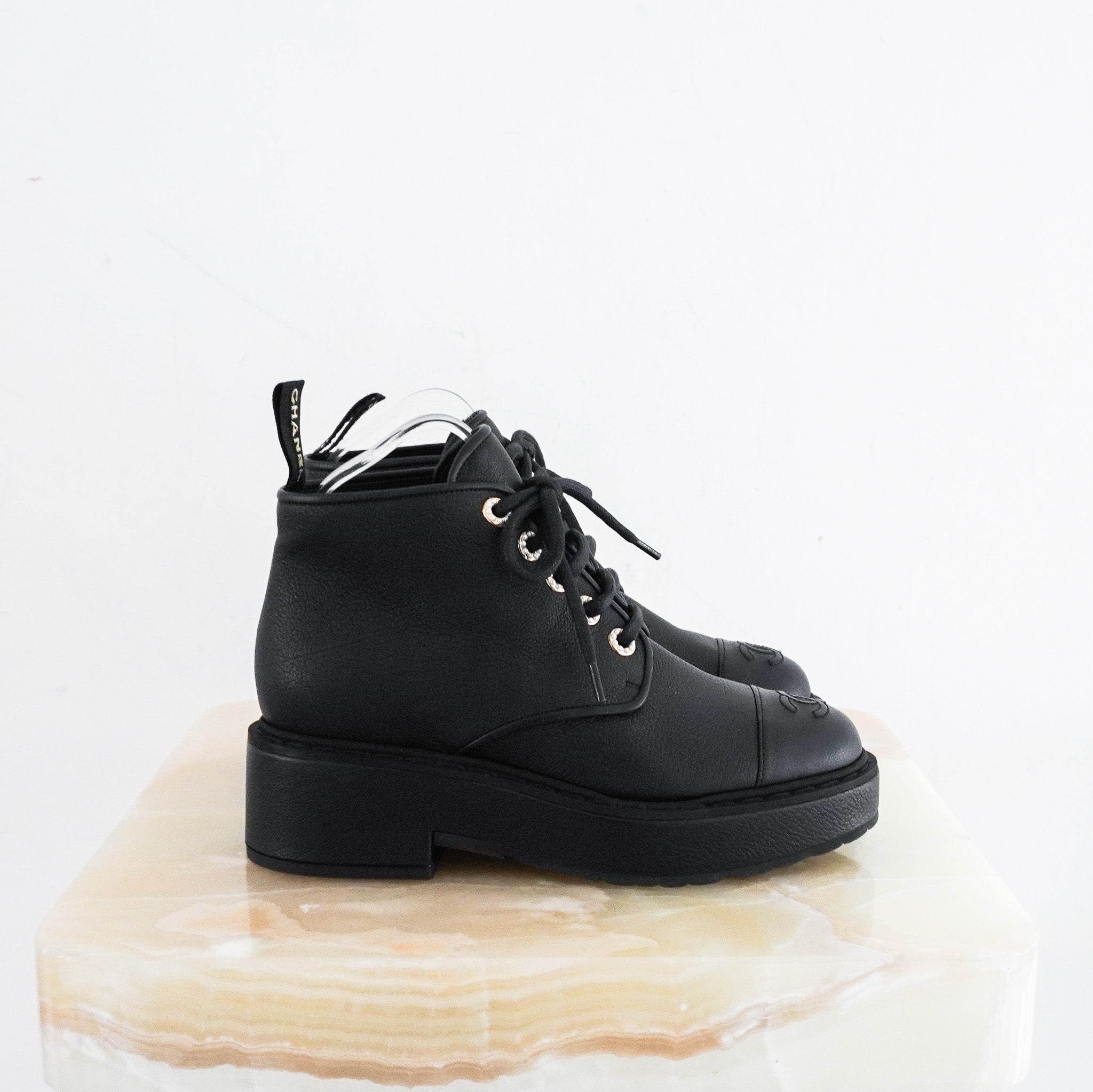 Chanel-Black-Leather-CC-Cap-Boots-side-picture
