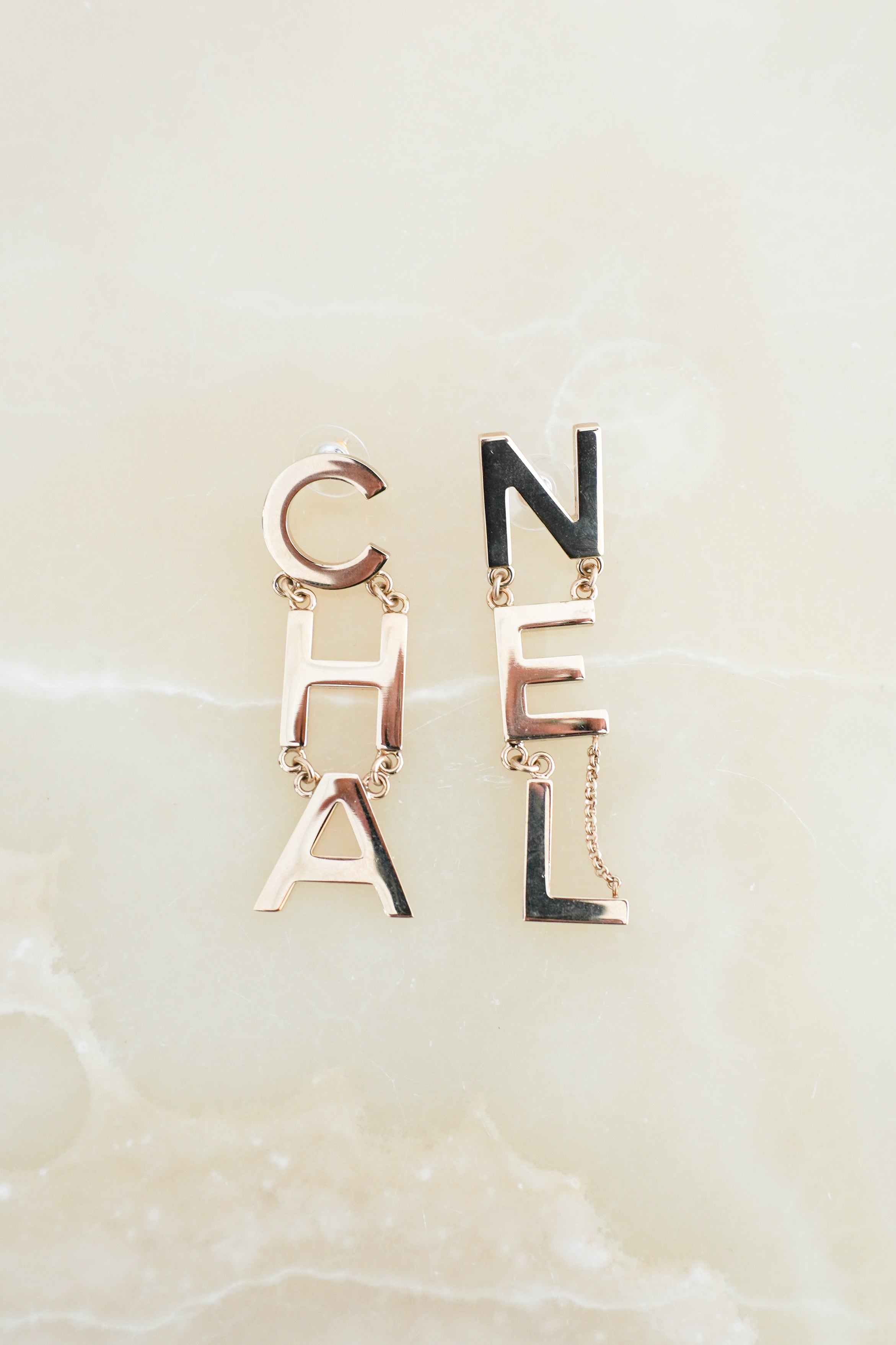 Chanel B20 Gold-Tone Letter Drop Earrings front photo chelsea london