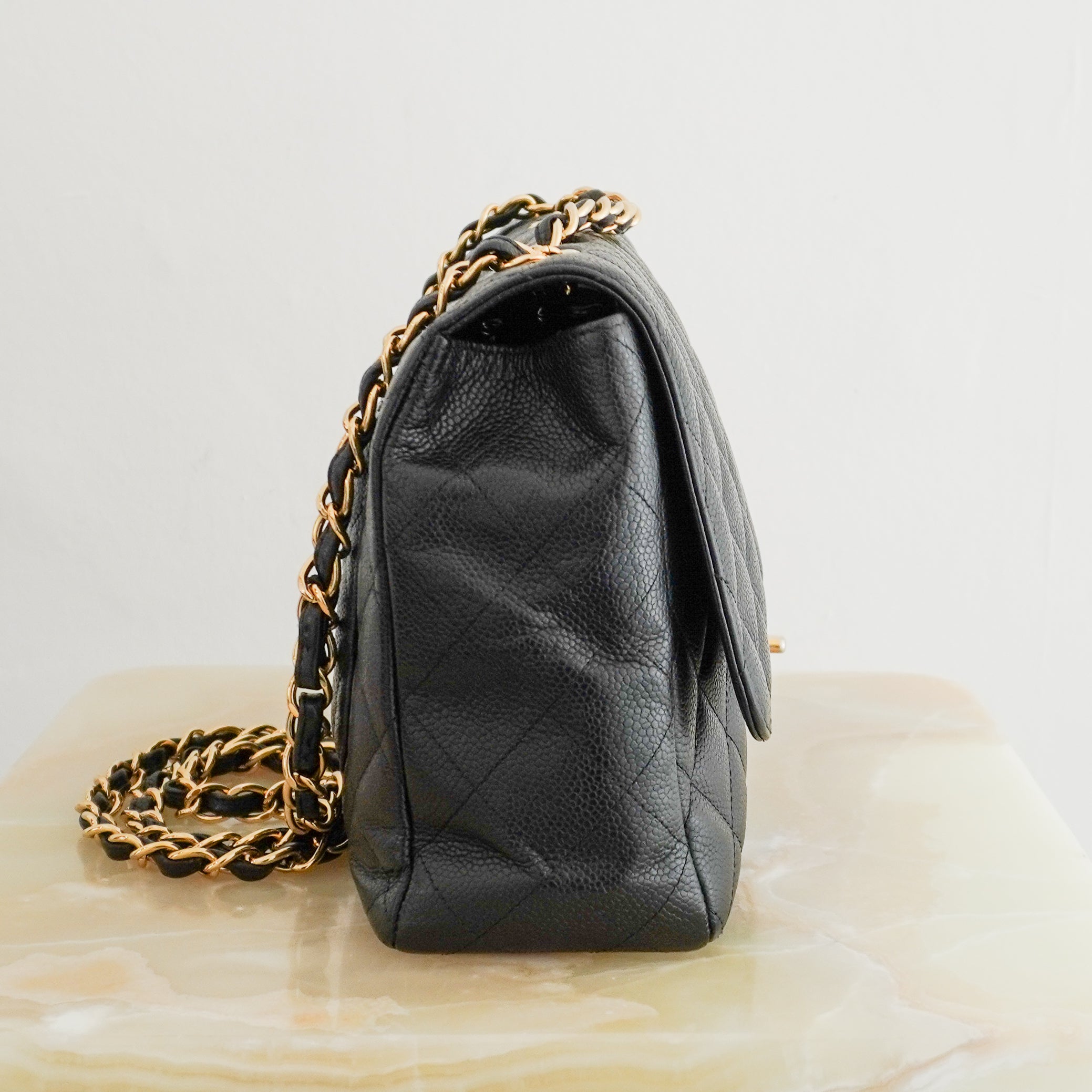 Chanel Black Large Classic Single Flap Bag Lambskin with Gold-Tone Hardware side photo chelsea london