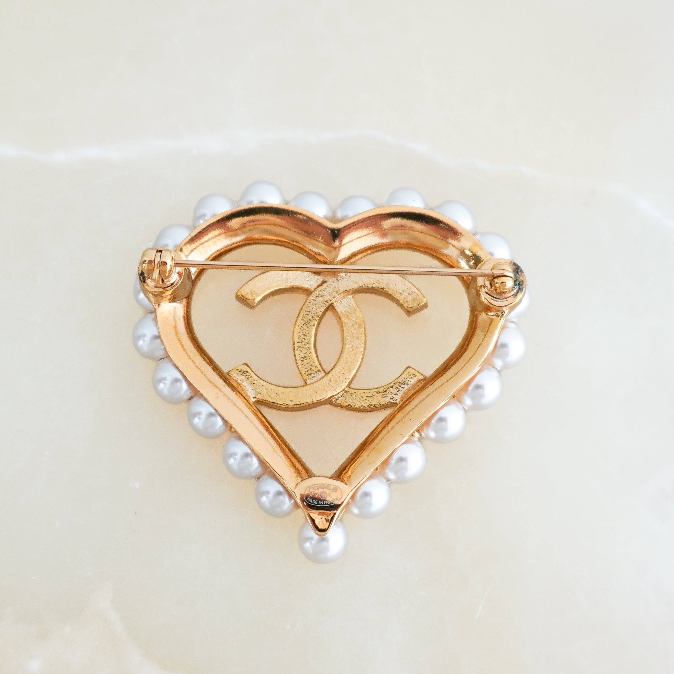 Chanel CC Heart Pearl Brooch in Gold-Tone Metal back photo chelsea london