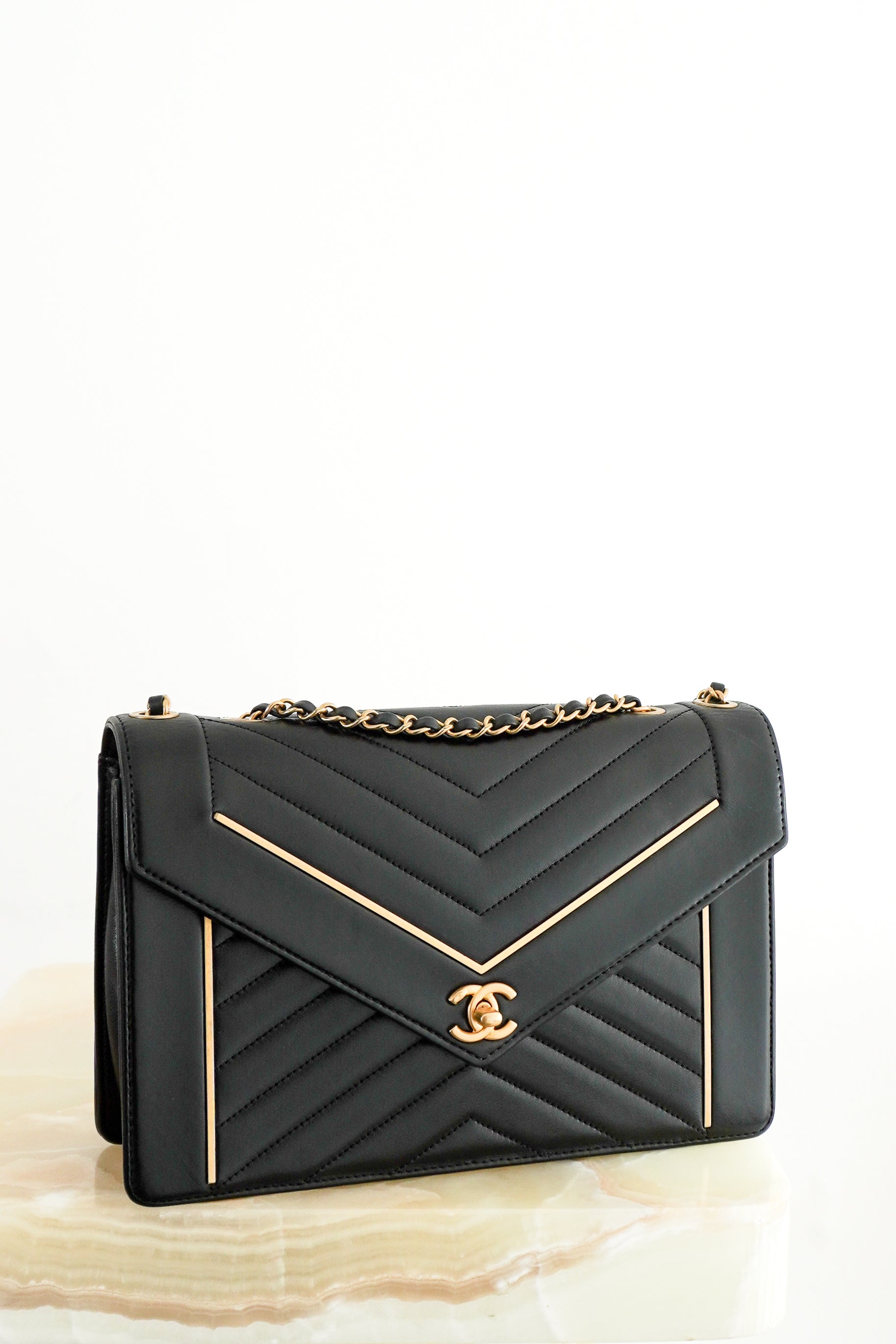 Chanel Chevron Flap Bag Black Lambskin Gold Hardware front photo chelsea london
