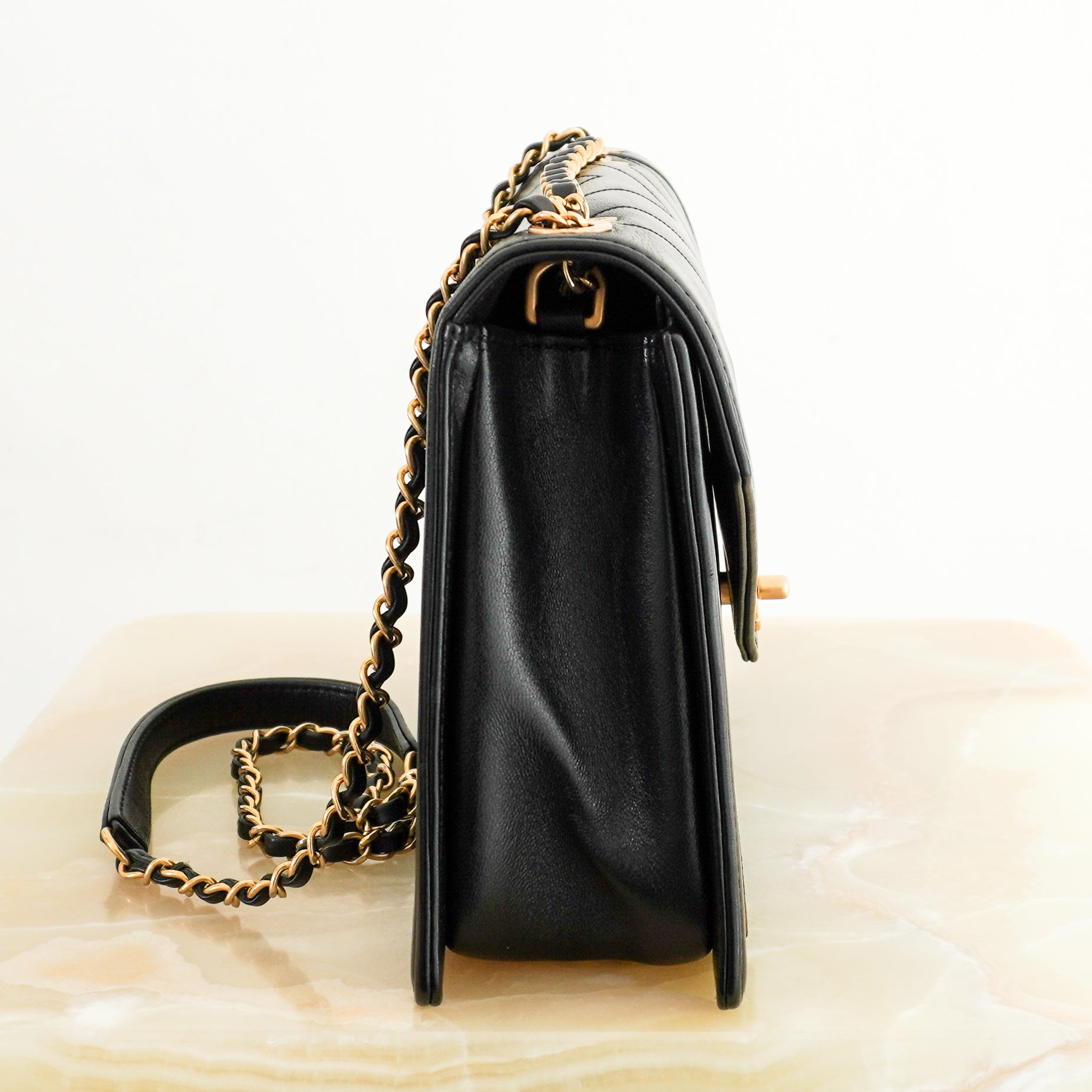 Chanel Chevron Flap Bag Black Lambskin Gold Hardware side photo chelsea london