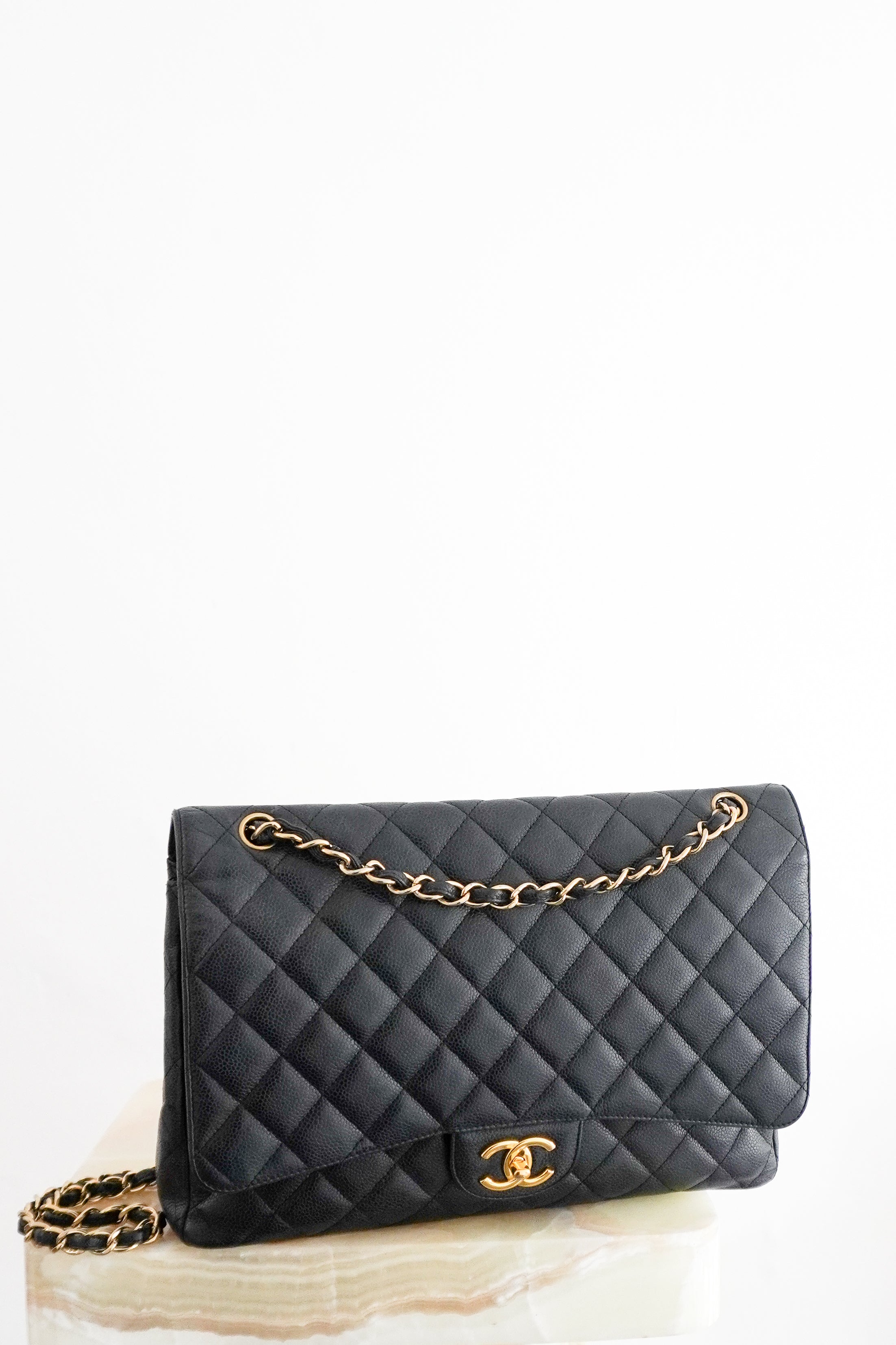 Chanel Jumbo Classic Double Flap Bag in Black Caviar Leather front photo chelsea london
