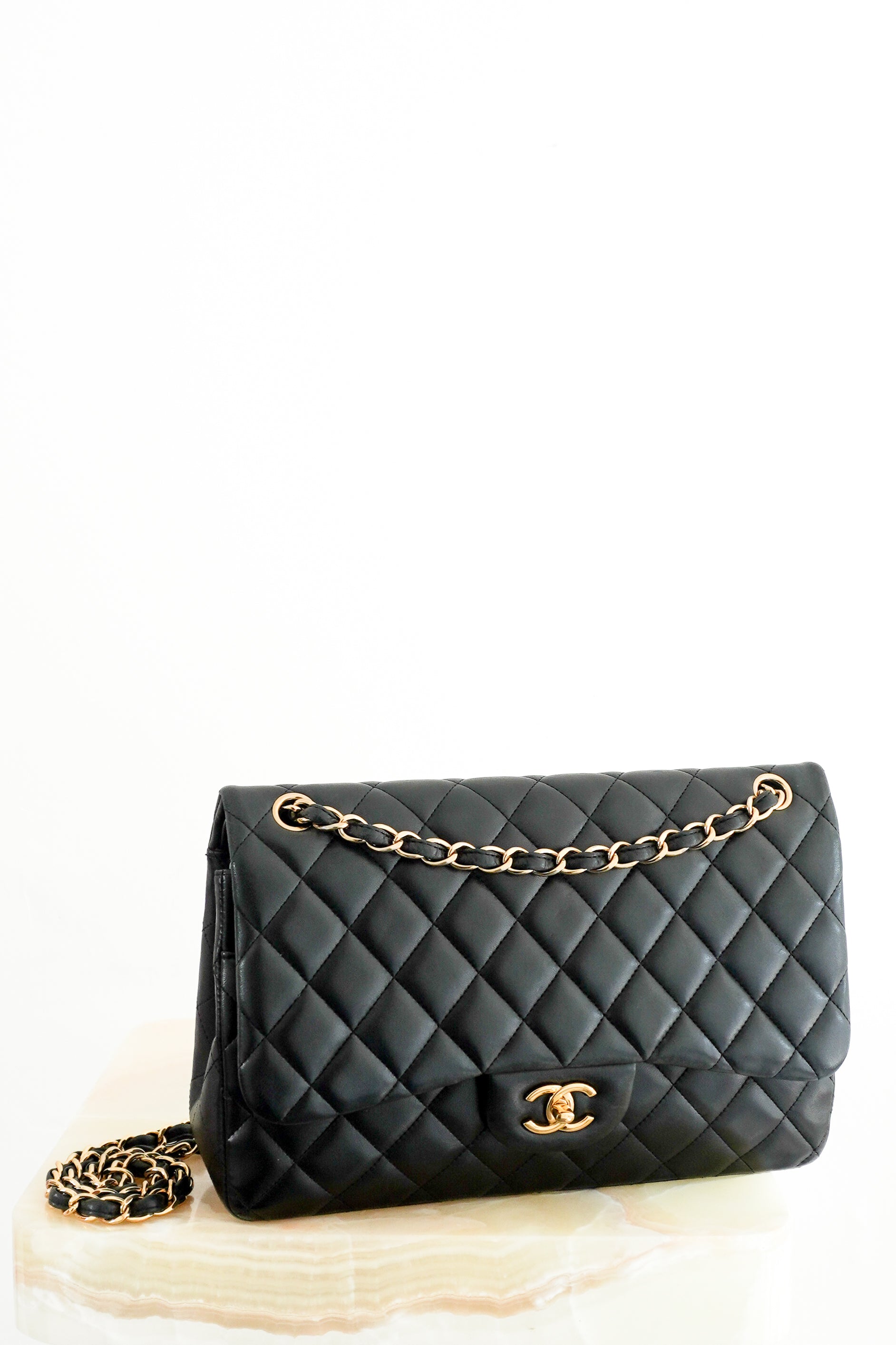 Chanel Jumbo Classic Handbag in Black Lambskin Leather with Gold-Tone Hardware front photo chelsea london