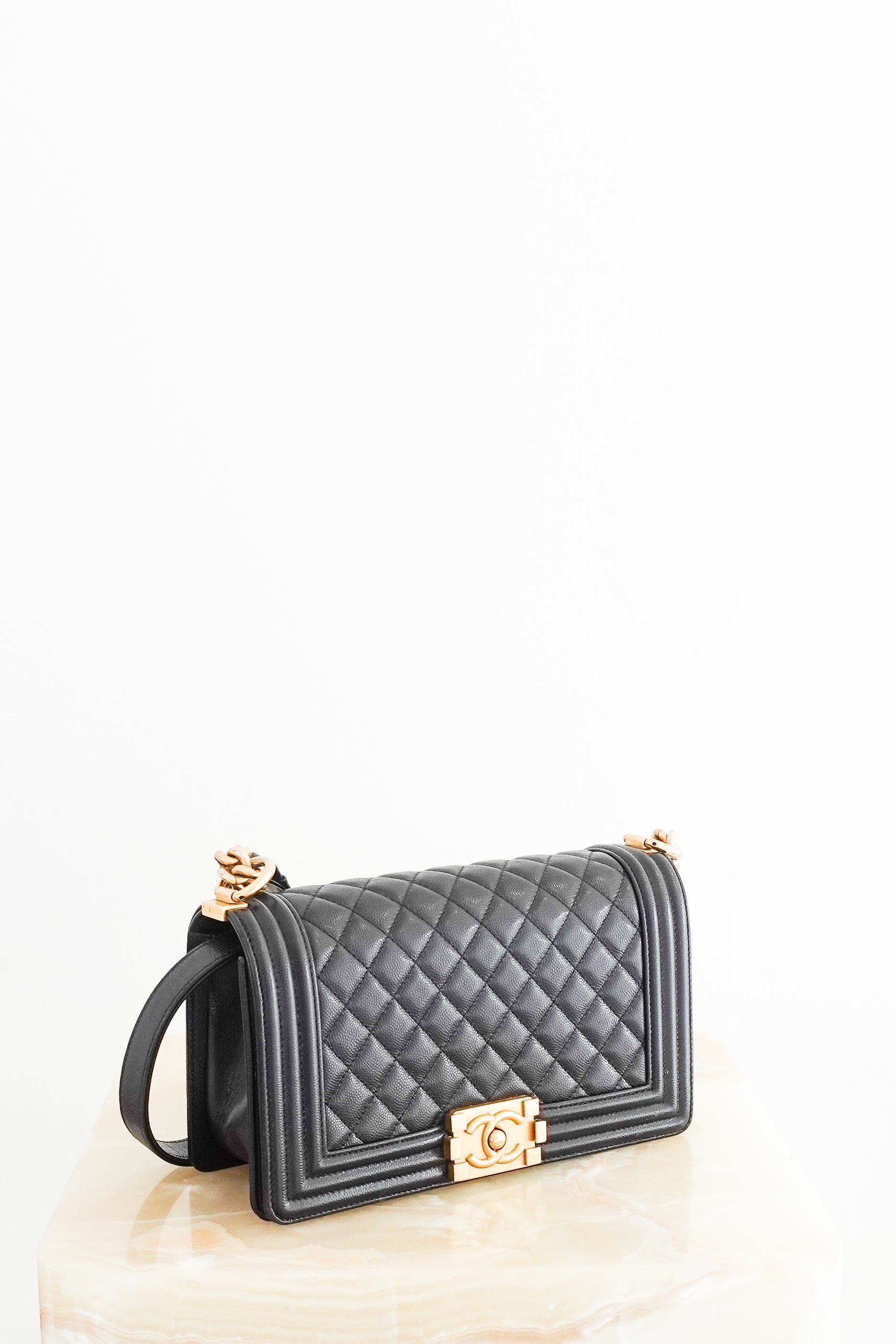 Chanel Medium Boy Bag in black caviar leather with gold CC clasp