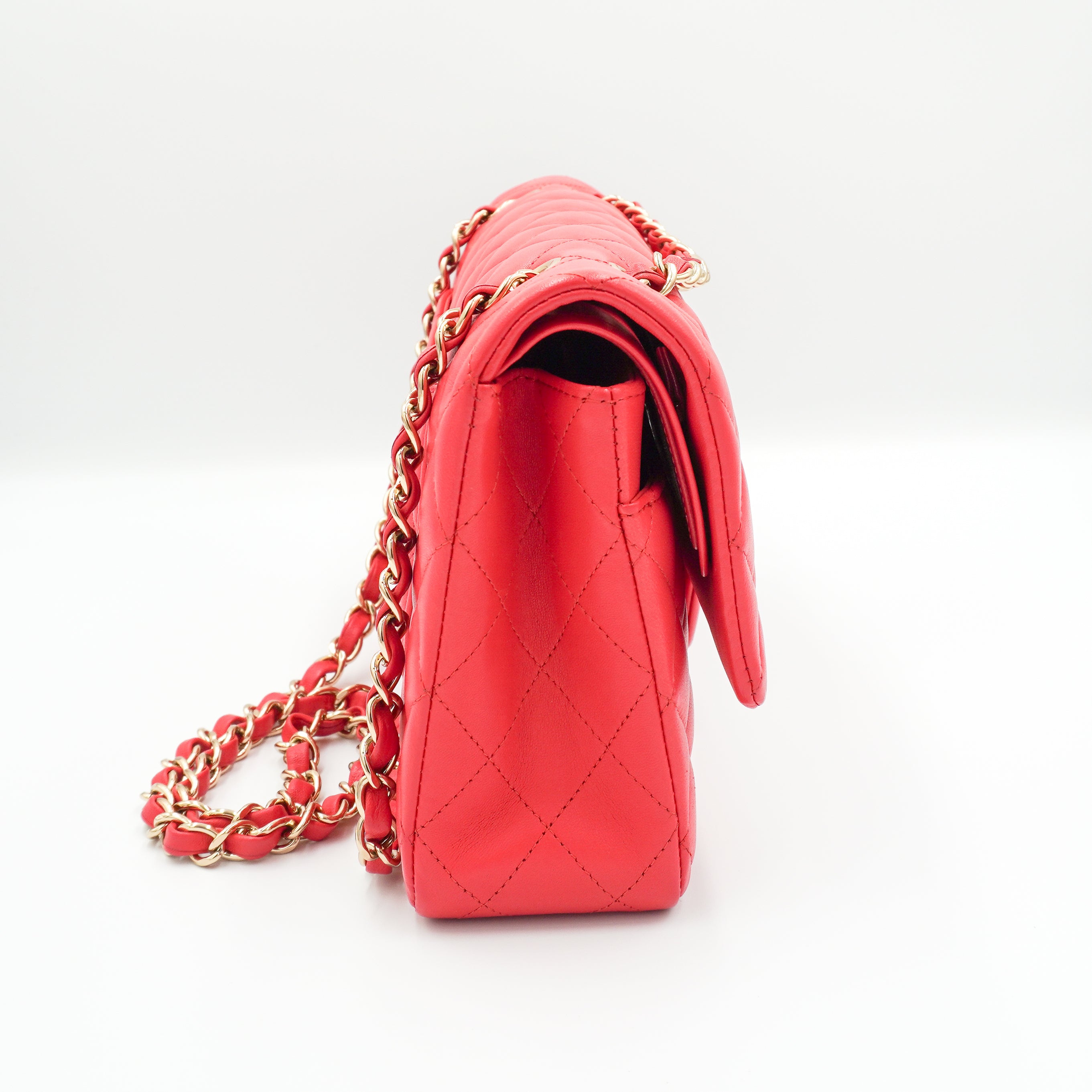 Chanel Medium Classic 11.12 Double Flap Bag Coral Quilted Lambskin Gold Hardware side photo chelsea london