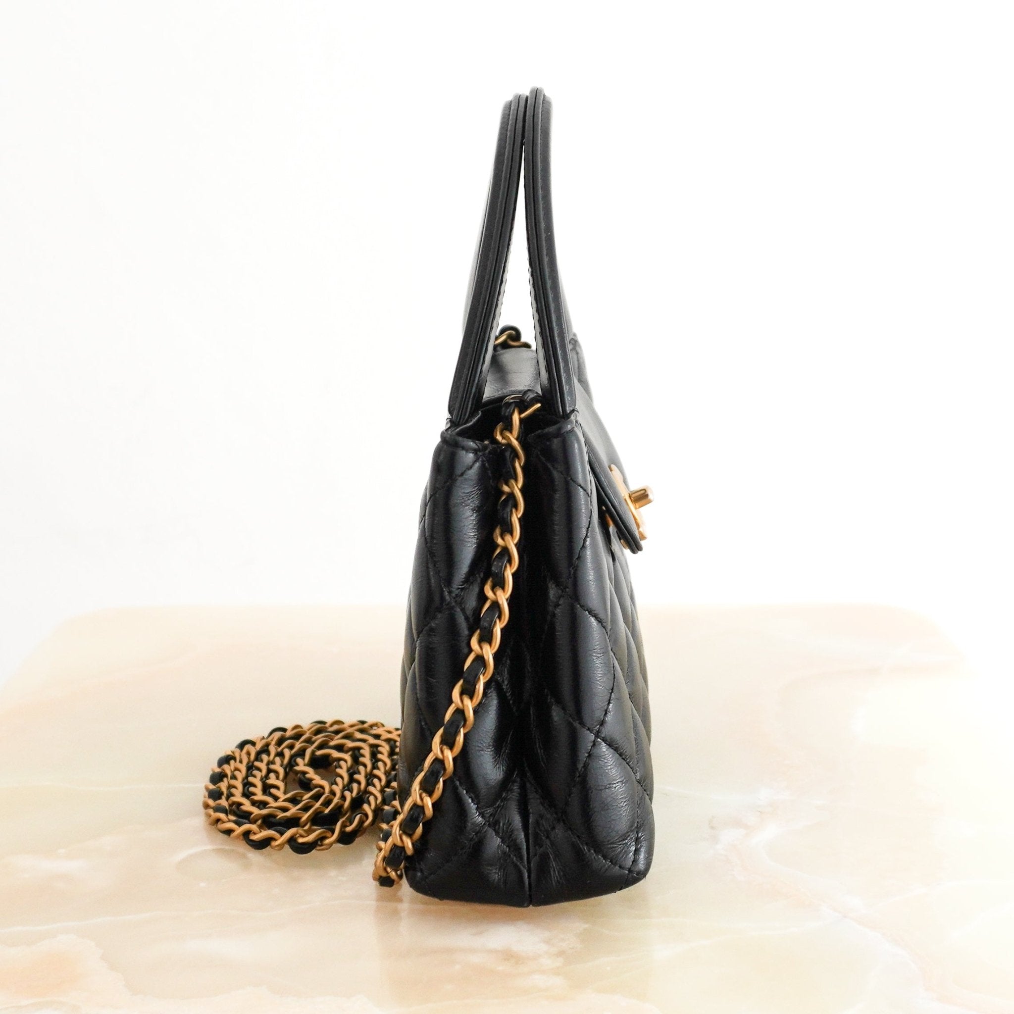 Chanel Small Kelly Re-Edition Top Handle Bag in Black Quilted Lambskin RRP (£4080) | Authentic Preloved - Reloved Again