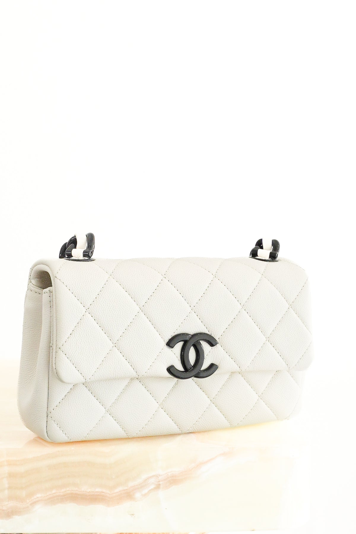 Chanel Quilted Flap Bag in Ivory Caviar Leather