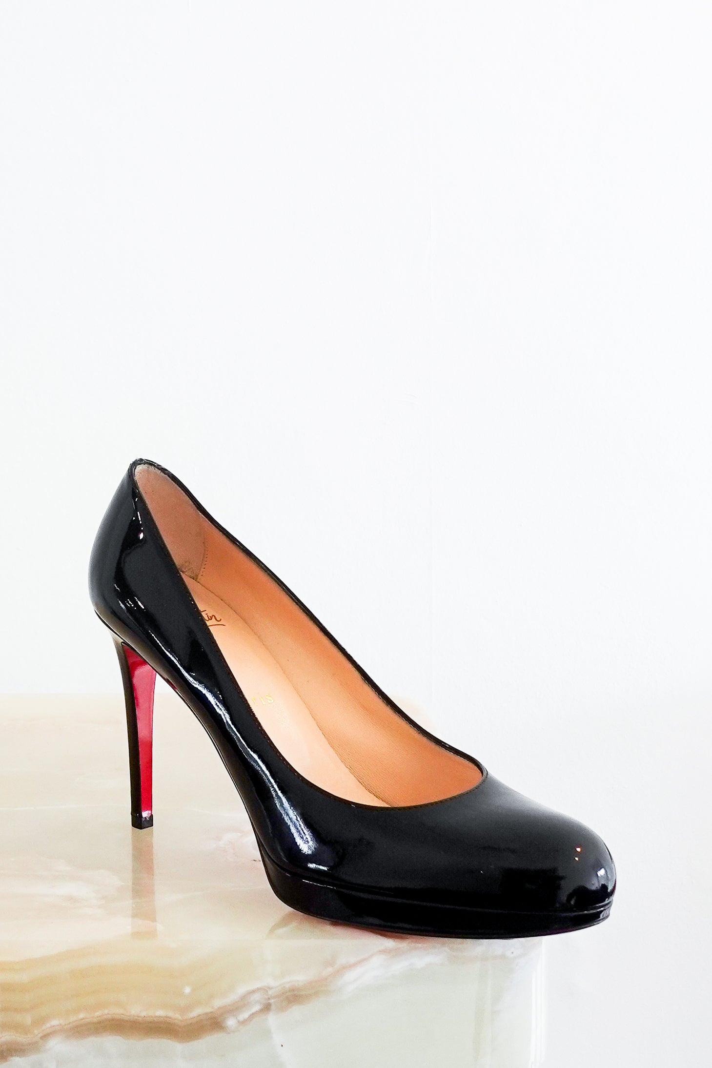 Christian Louboutin Patent Heeled Pumps in black 