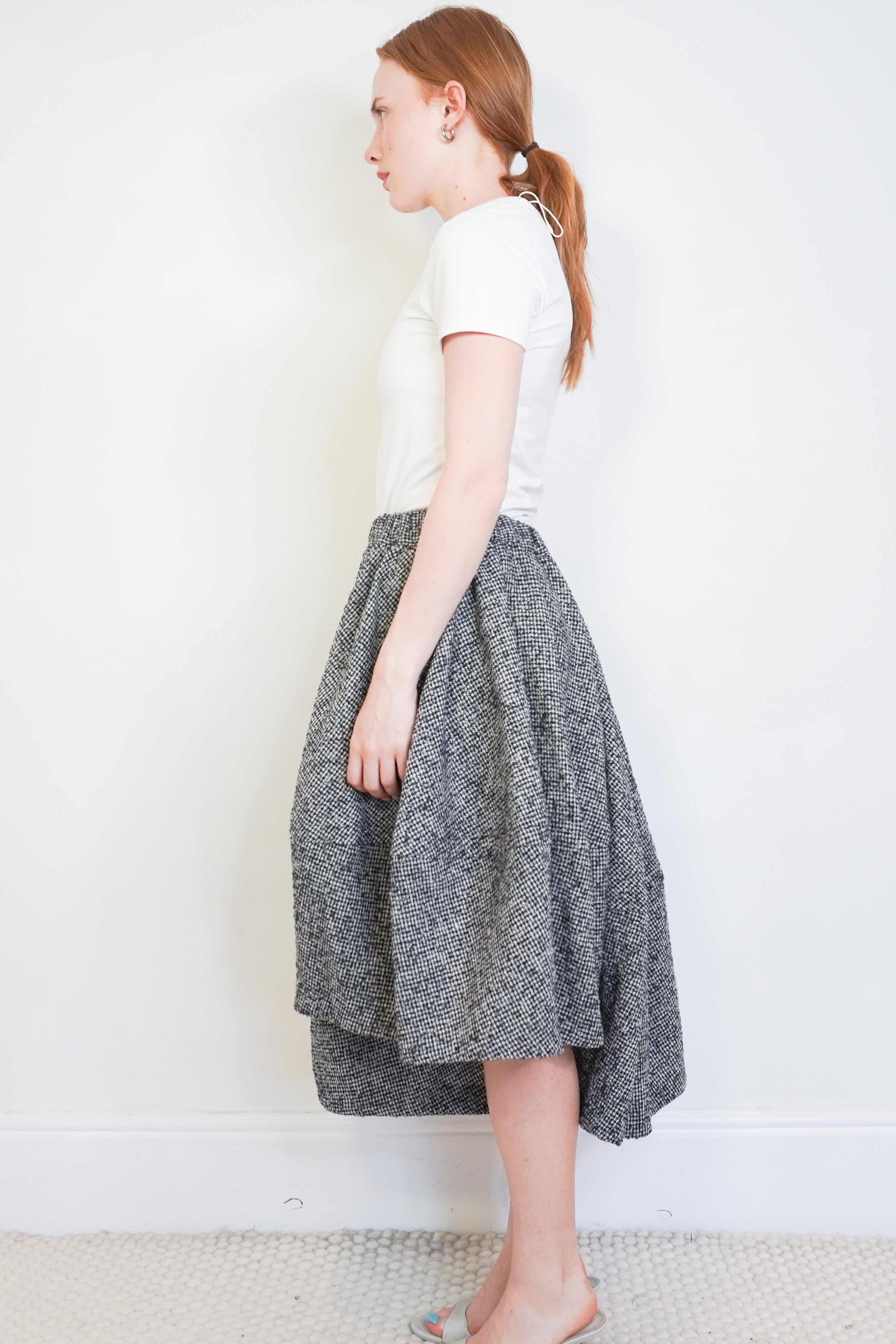 Commes de Garçons Black &amp; Ecru Pinwheel Houndstooth Asymmetric Wool Skirt side photo chelsea london