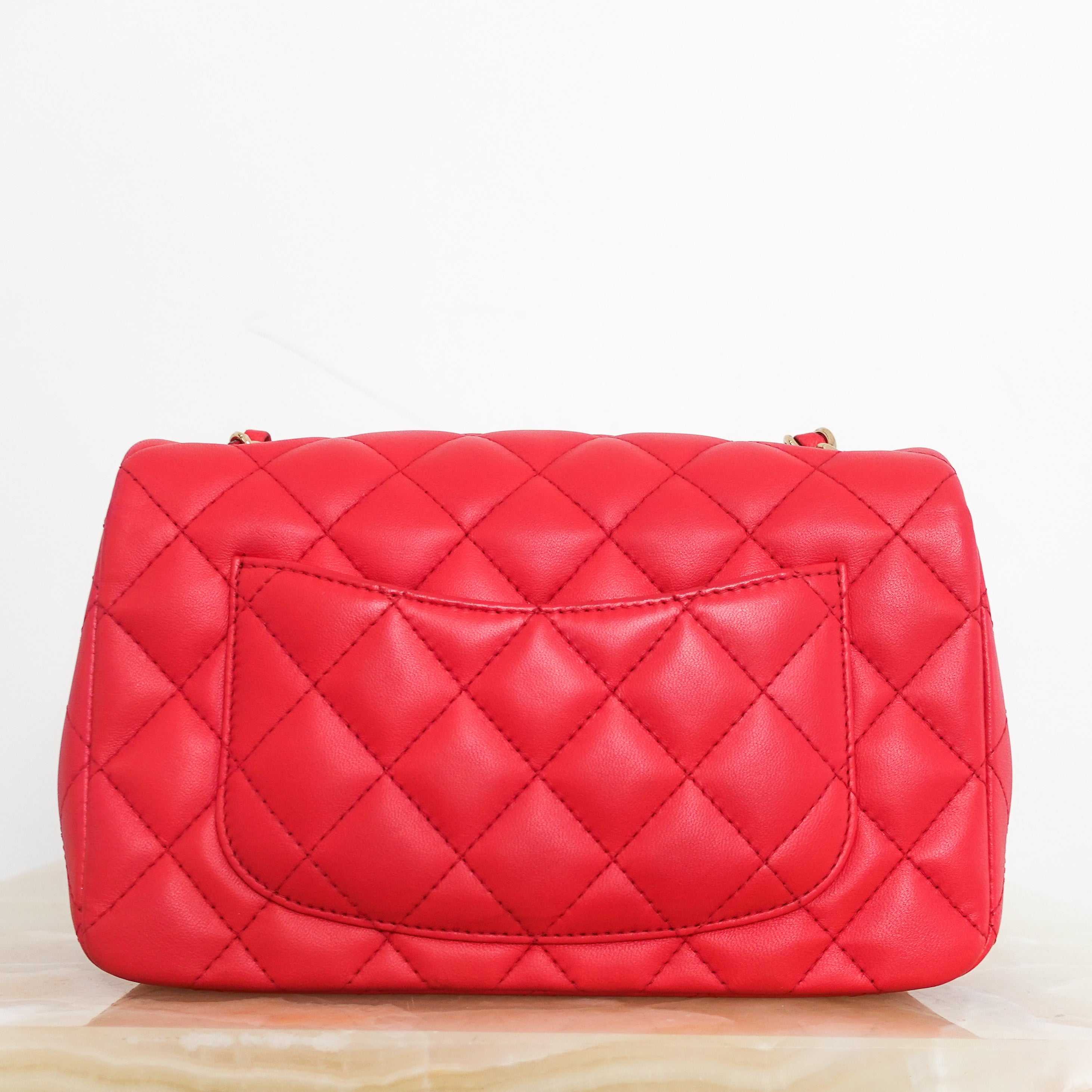 Red mini flap bag RRP £4550