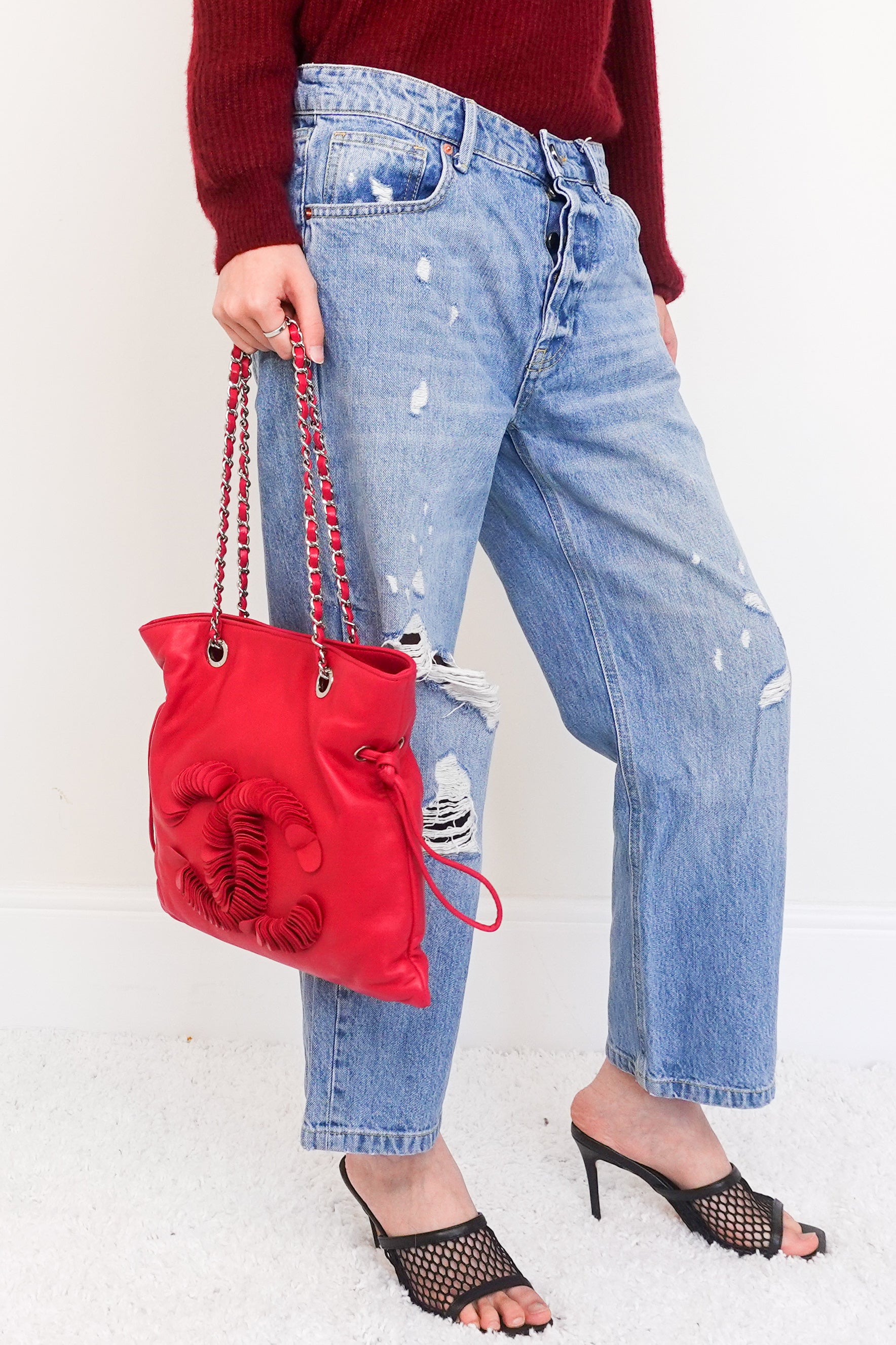 red leather disc bon bon bag