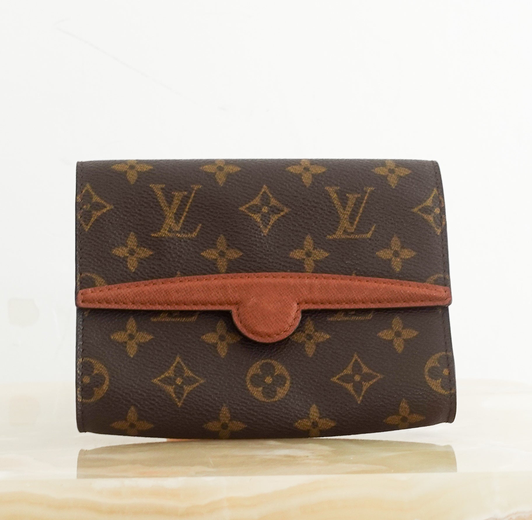 Monogram clutch bag