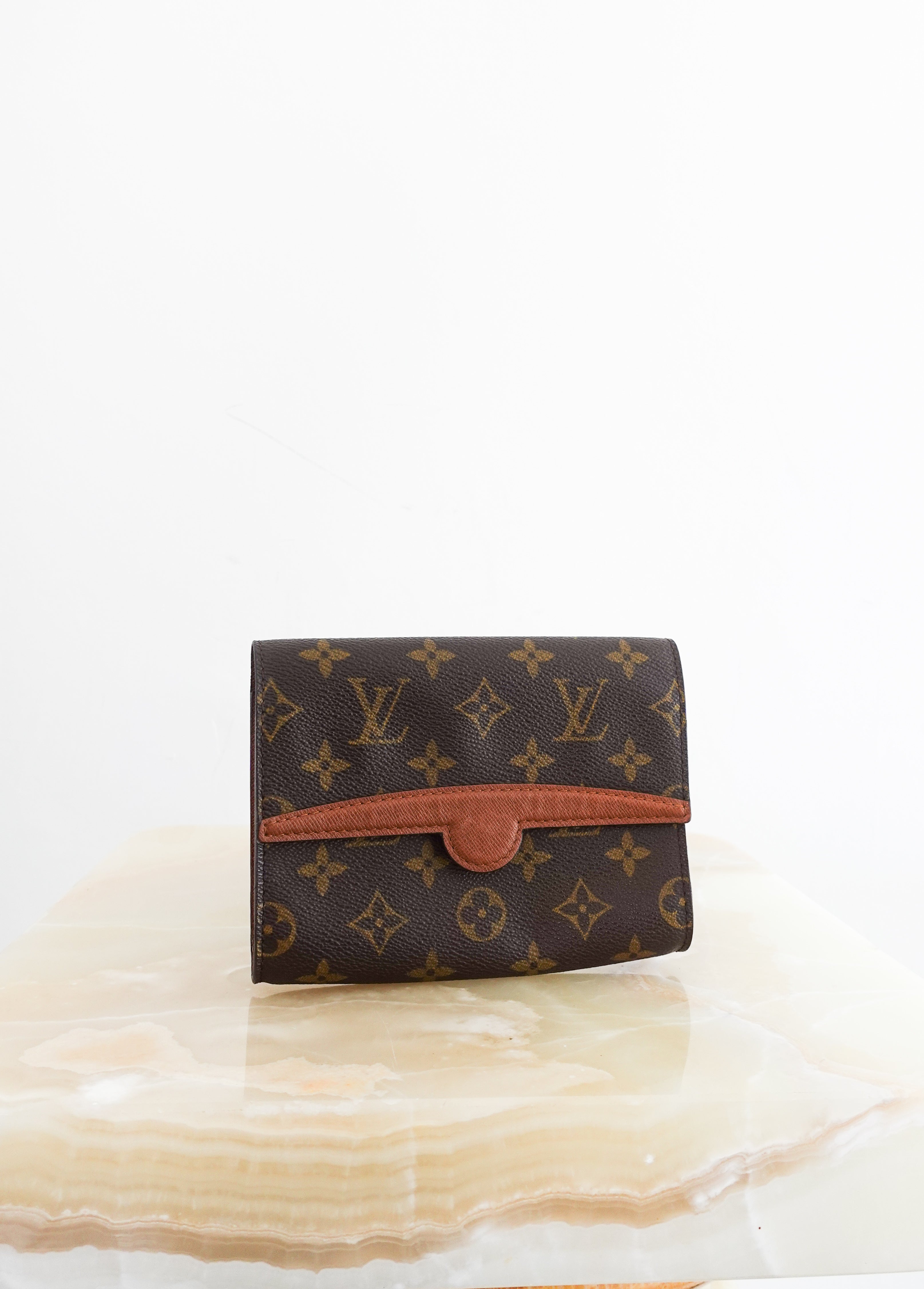 Monogram clutch bag