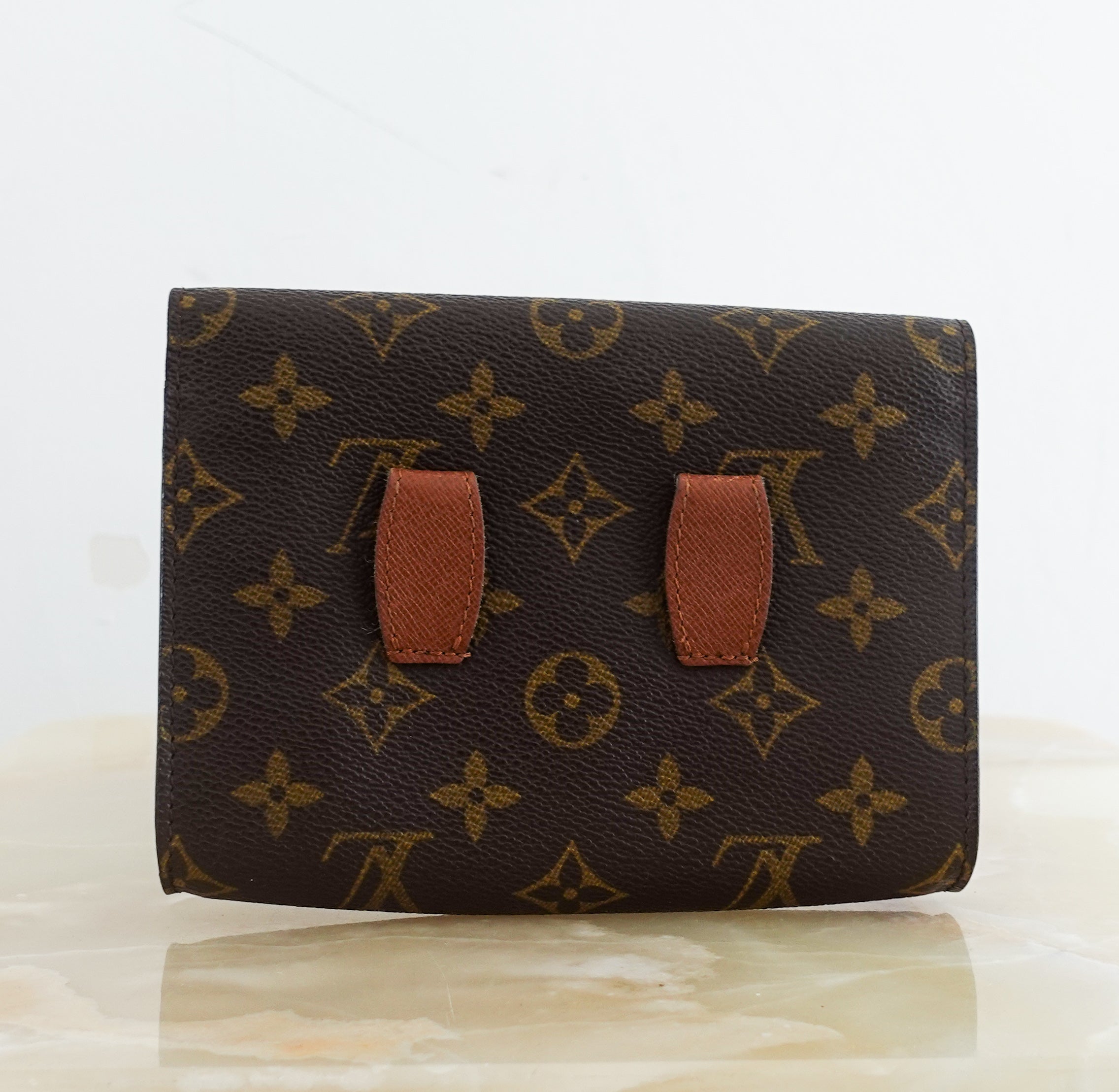 Monogram clutch bag