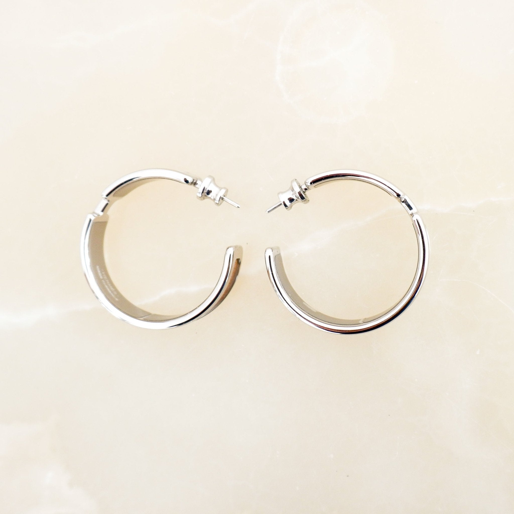Hermès Olympe Earrings in Palladium-Plated Metal & Doré Metallic Leather (RRP £660) | Authentic Preloved FINAL SALE - Reloved Again