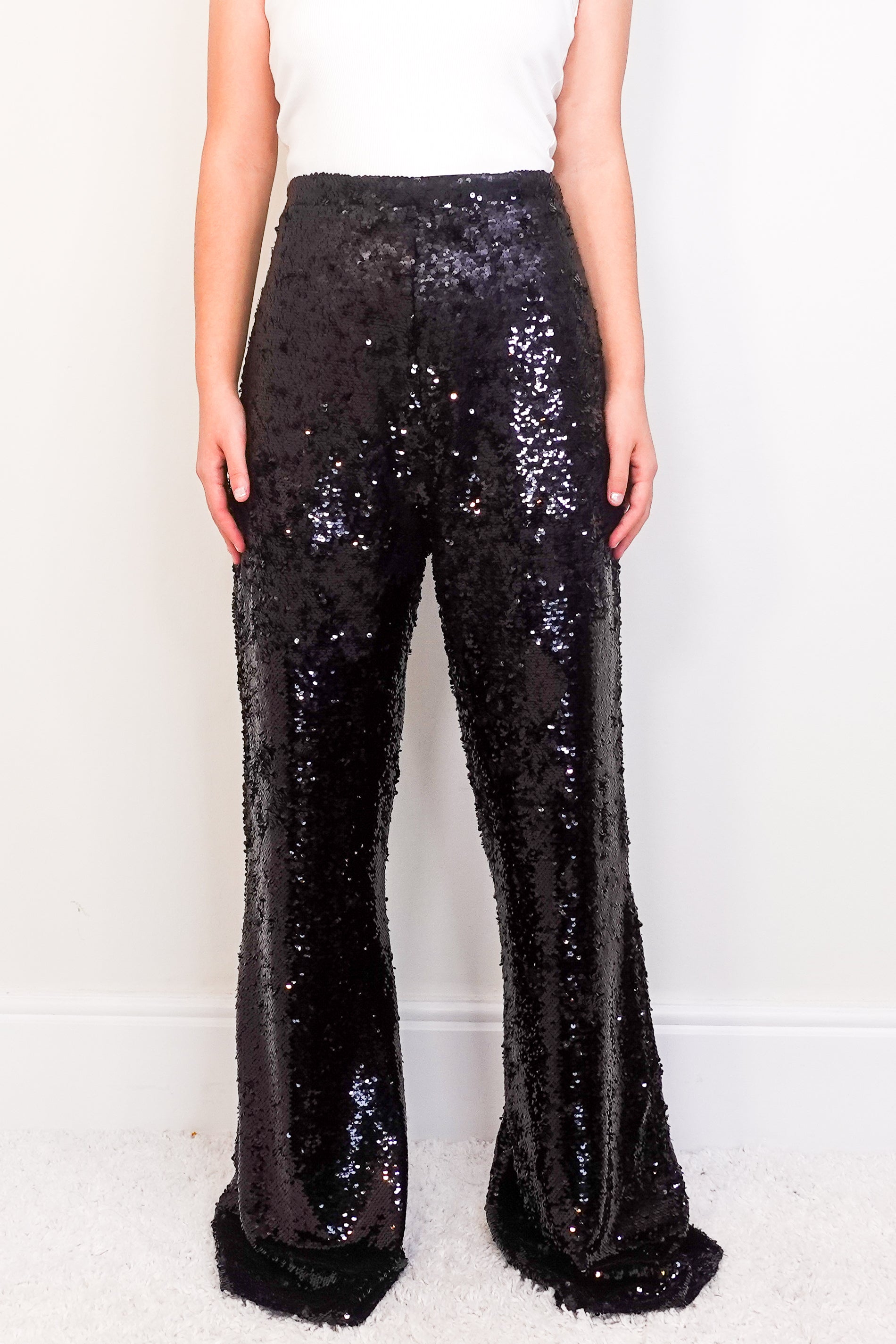 Black sequin trousers RRP £600