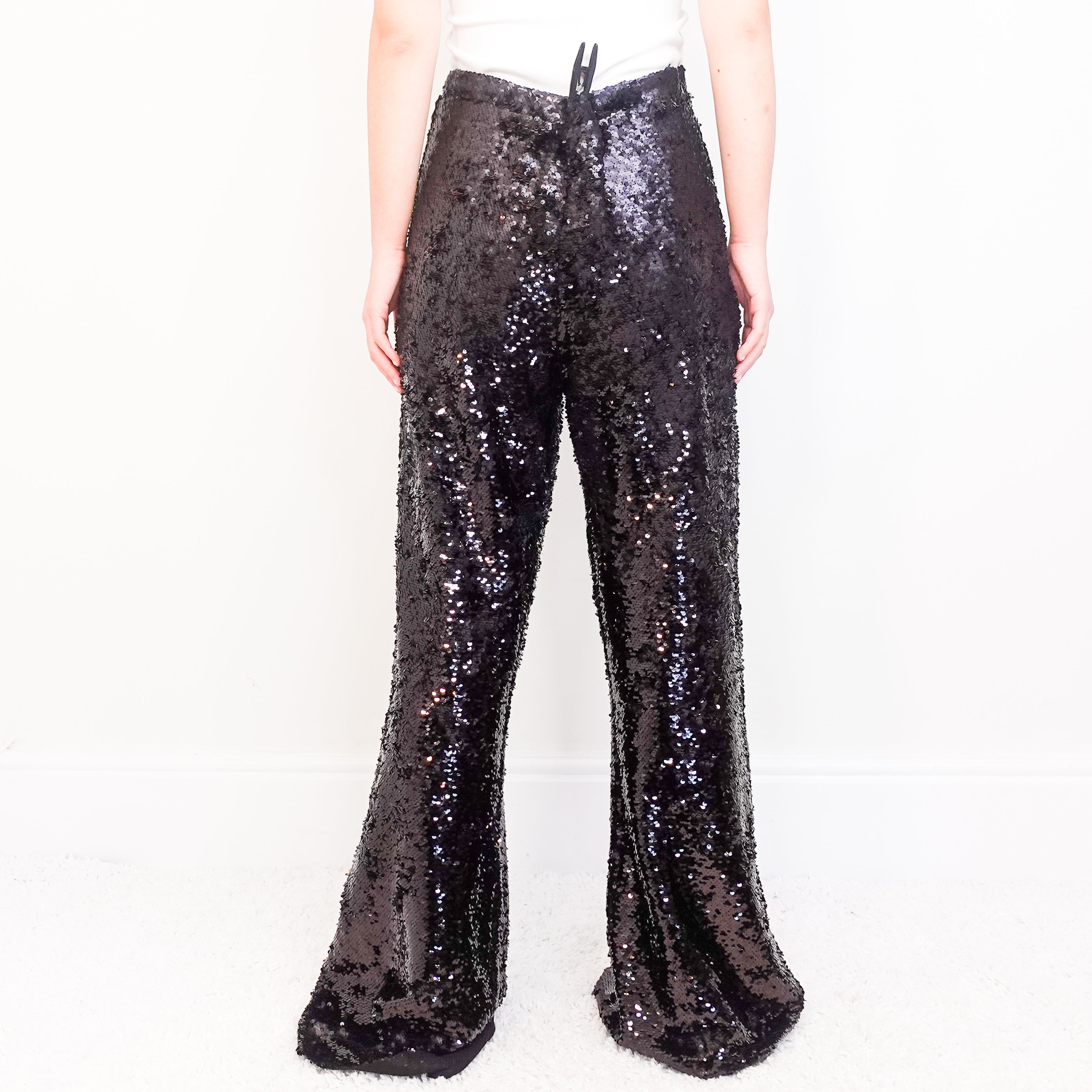 Black sequin trousers RRP £600