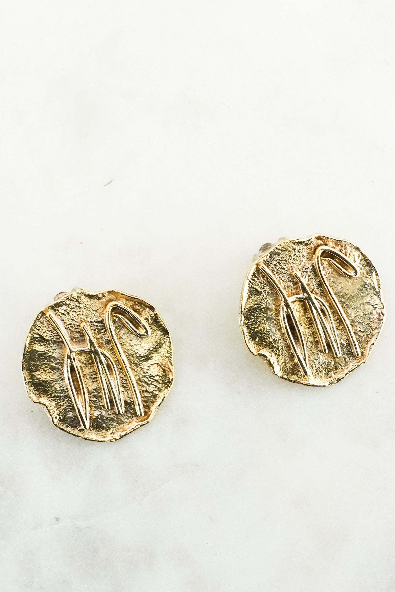 X Ian Young gold toned clip on earrings