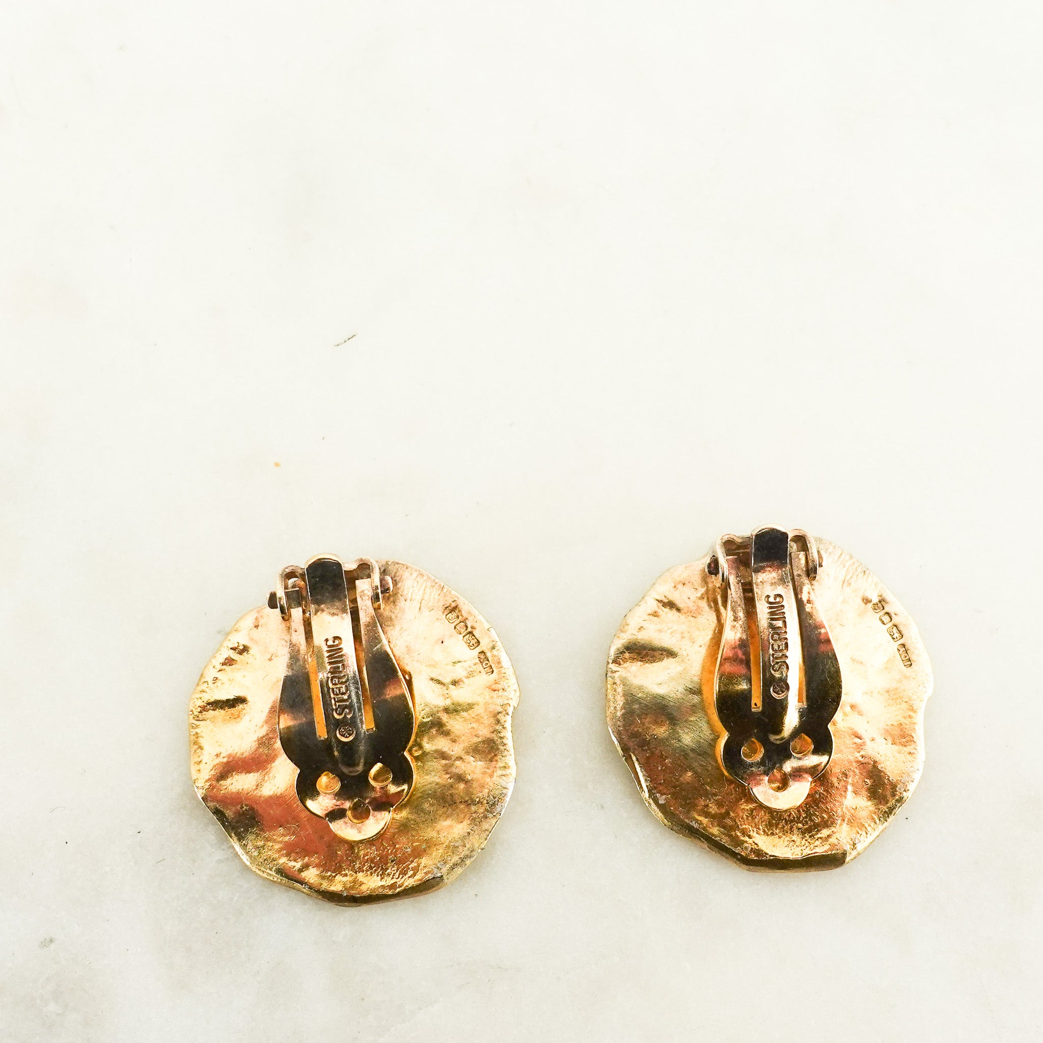 X Ian Young gold toned clip on earrings