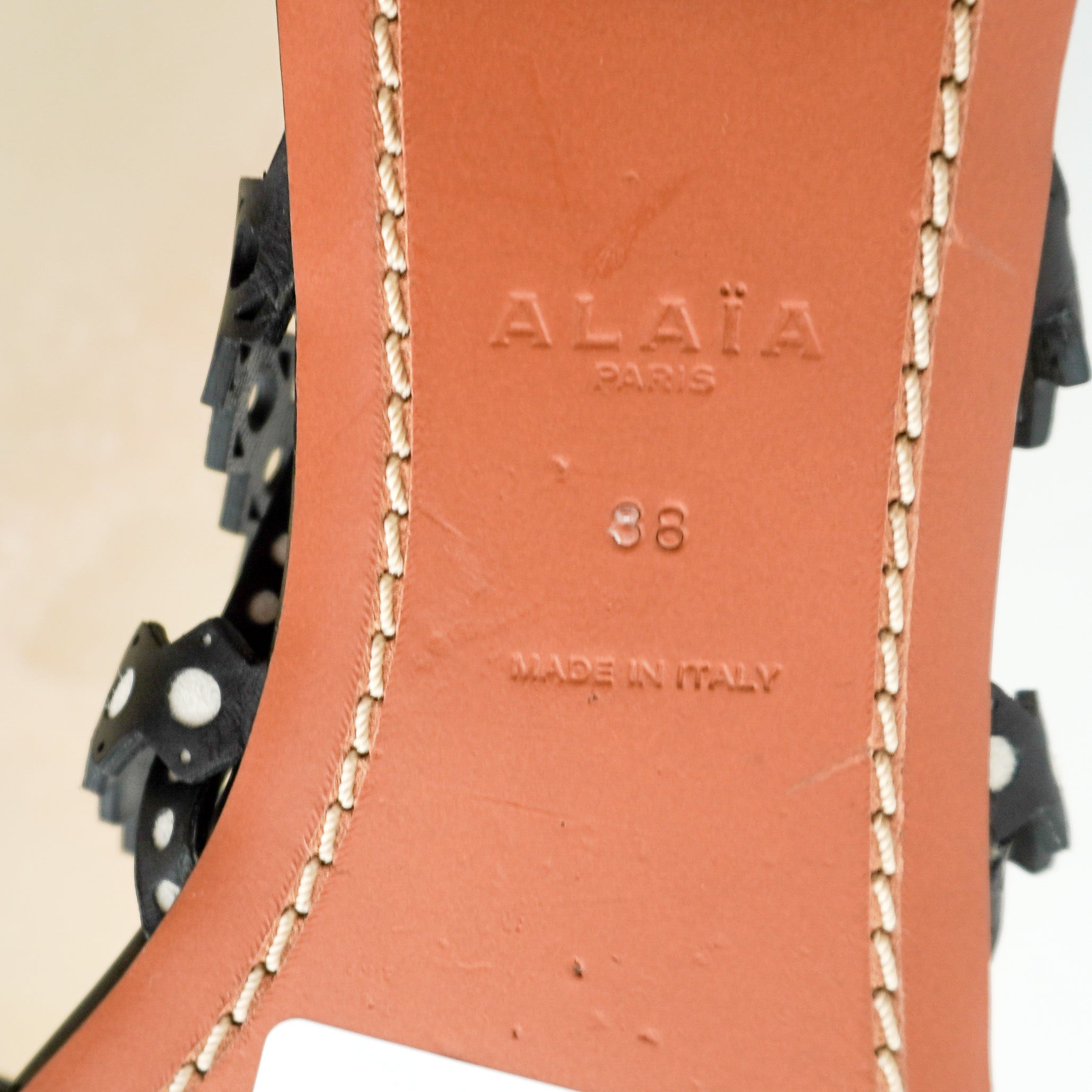 ALAÏA Laser-Cut Leather Flat Sandals in Black (RRP £690) | Authentic Preloved