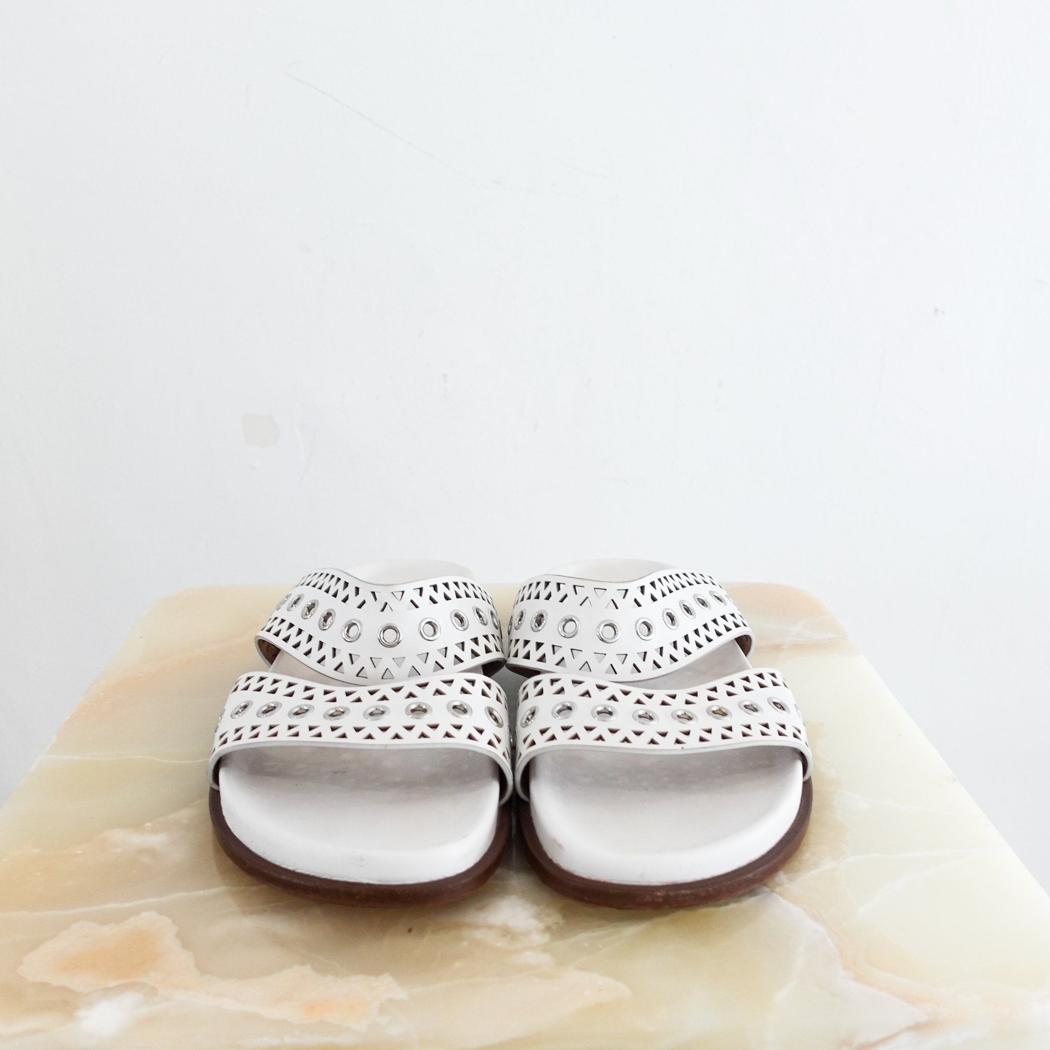 Alaia Perforated Sliders in white RRP £750 | Authentic Preloved - Reloved Again